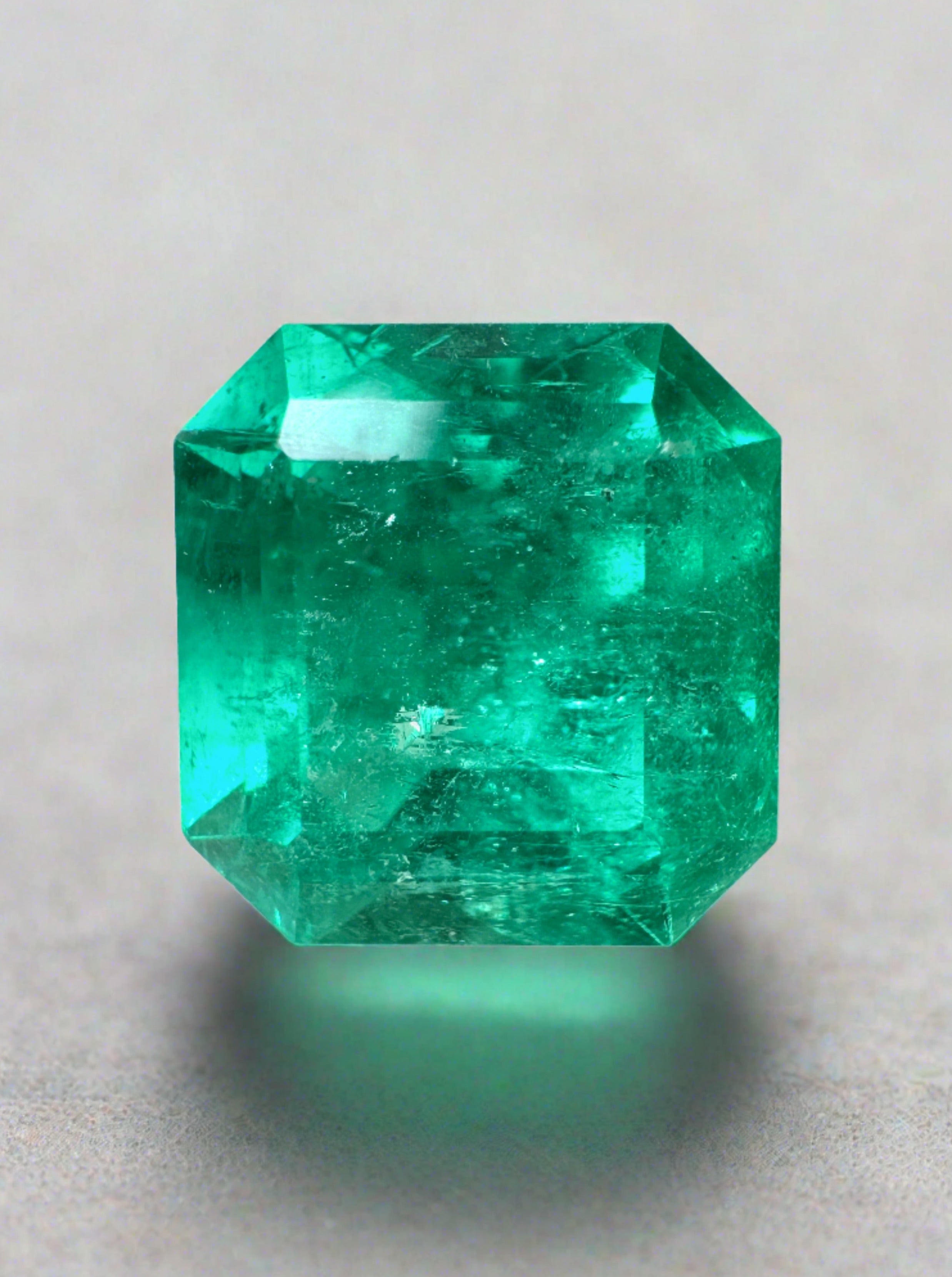 Vibrant 4.83 carat Colombian emerald loose gemstone with 10x10mm Asscher cut, from JR Colombian Emeralds.
