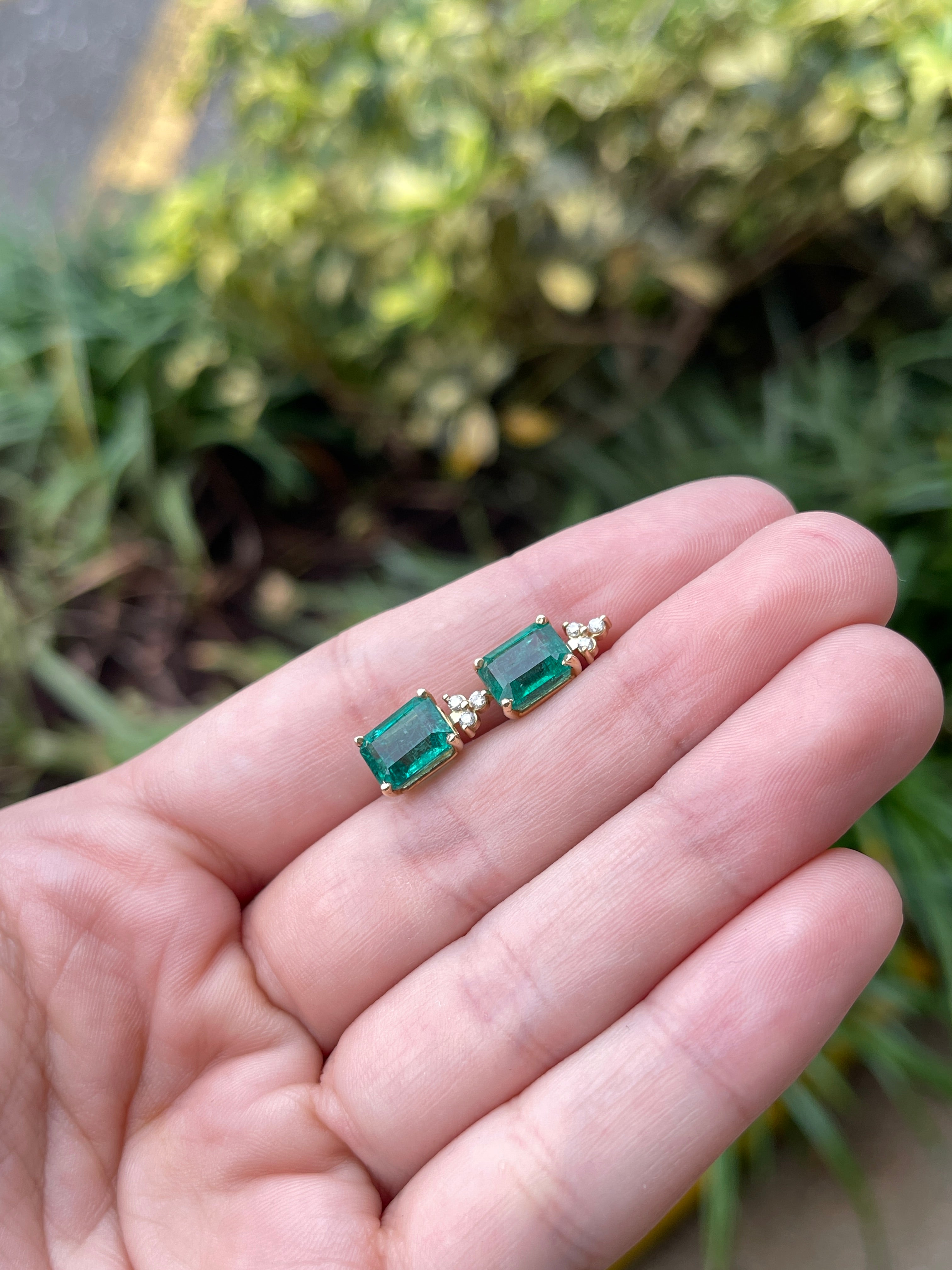 Rich green emerald and diamond accent stud earrings in 14K gold, featuring 4.87 carats from JR Colombian Emeralds.