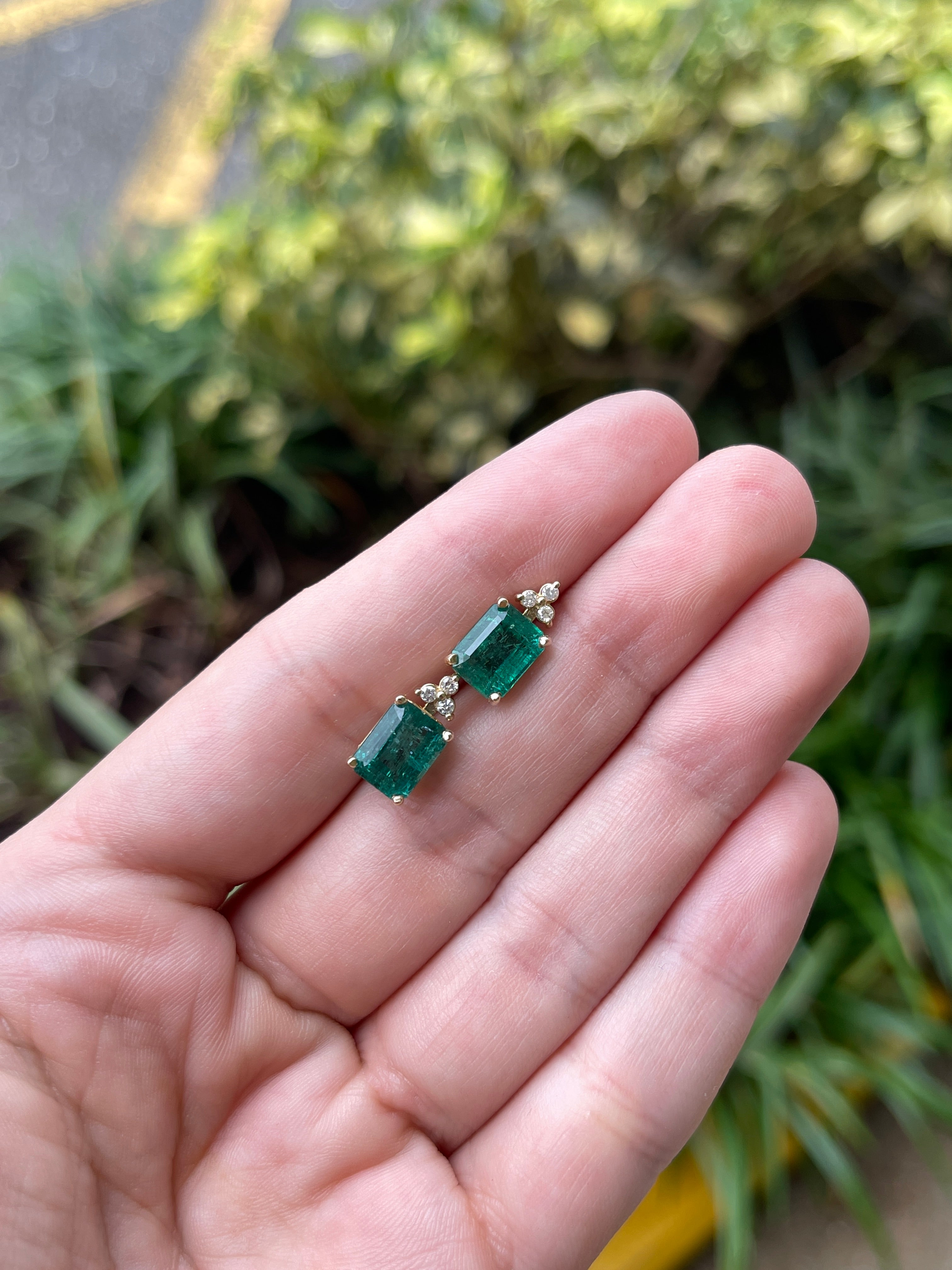 14K gold stud earrings with rich green emeralds and diamond accents, featuring 4.87 carats total weight, by JR Colombian Emeralds.