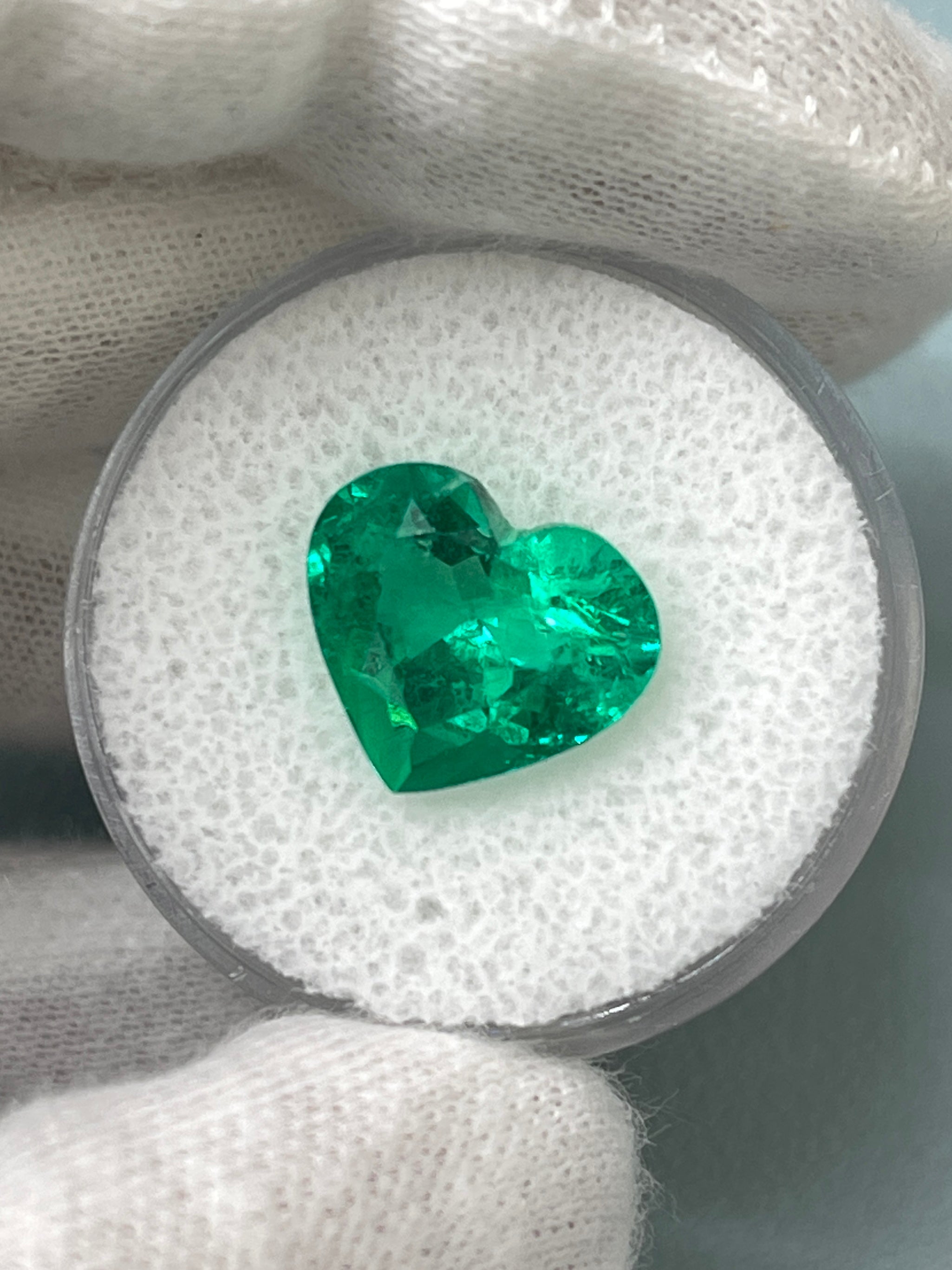 Vivid green 4.92 carat natural Colombian emerald in heart cut, AAA+ quality, loose gemstone from JR Colombian Emeralds.