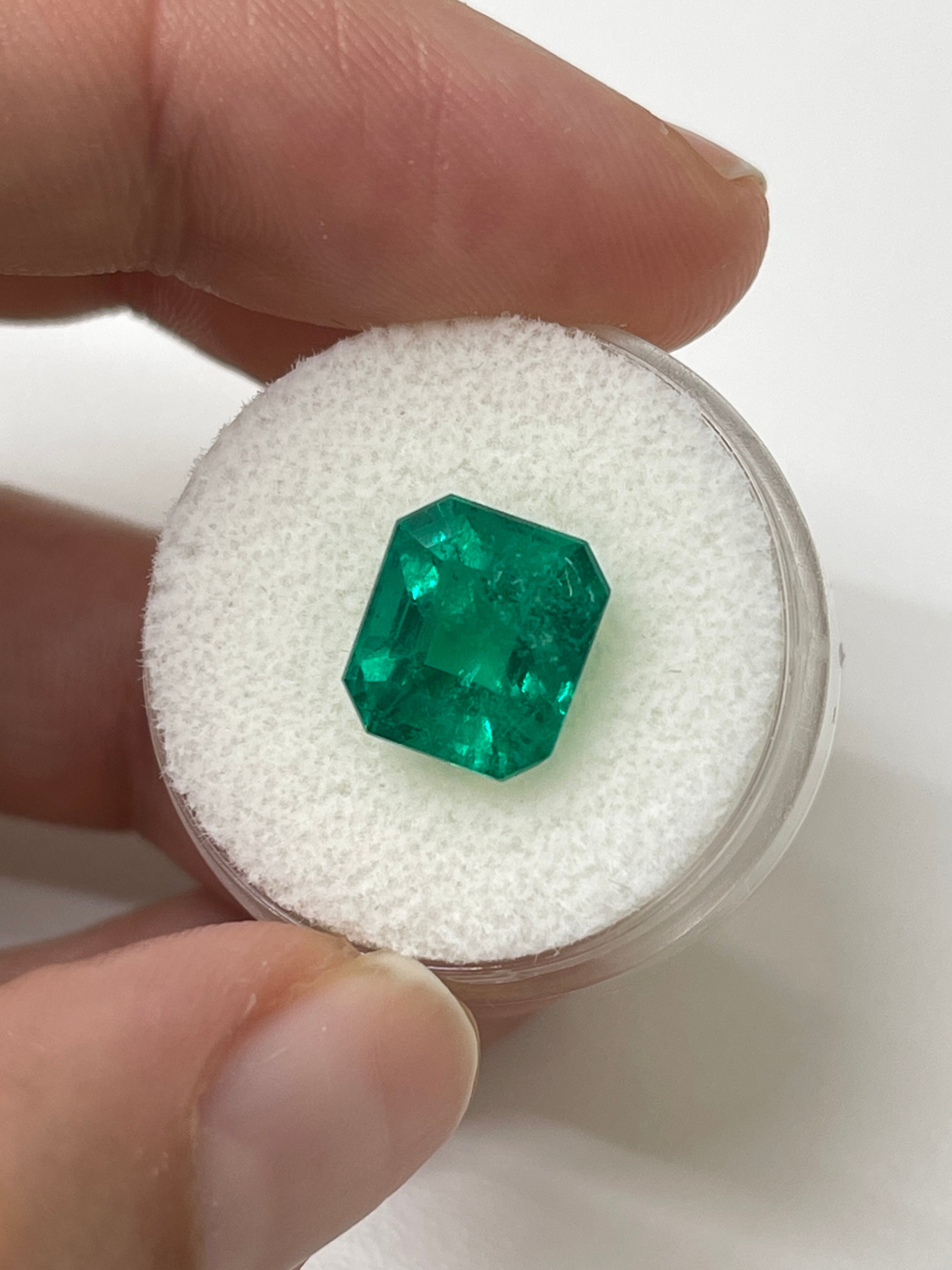 4.93 carat AAA+ Colombian emerald cut natural loose emerald from JR Colombian Emeralds, showcasing vibrant green color and clarity
