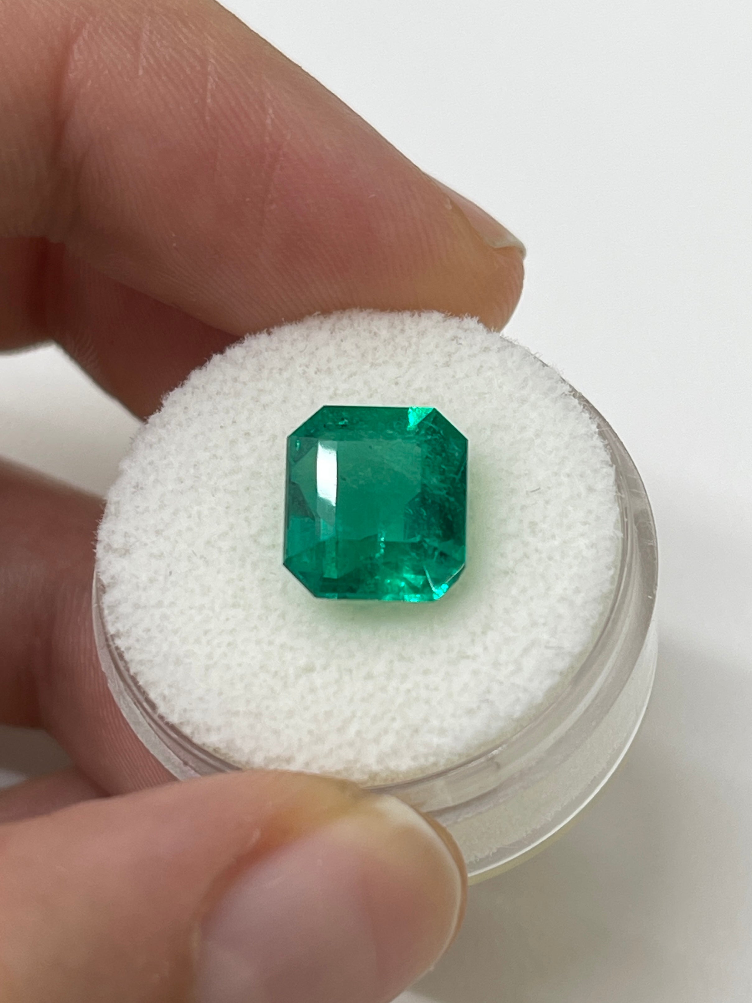 4.93 carat natural Colombian emerald cut loose gemstone with AAA+ investment grade quality from JR Colombian Emeralds.