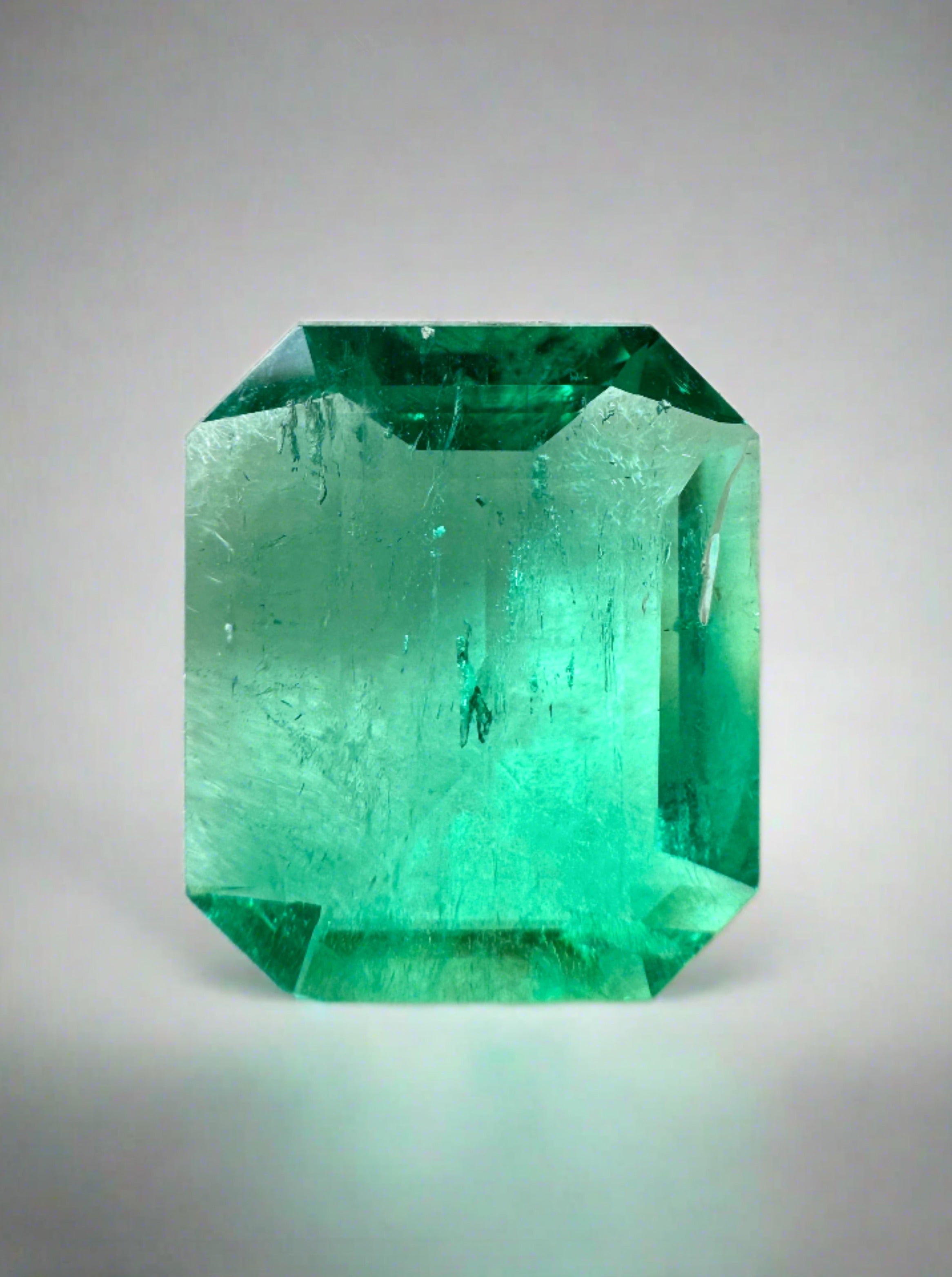 5.15 carat bluish green emerald cut loose Colombian emerald with very good luster and transparent clarity