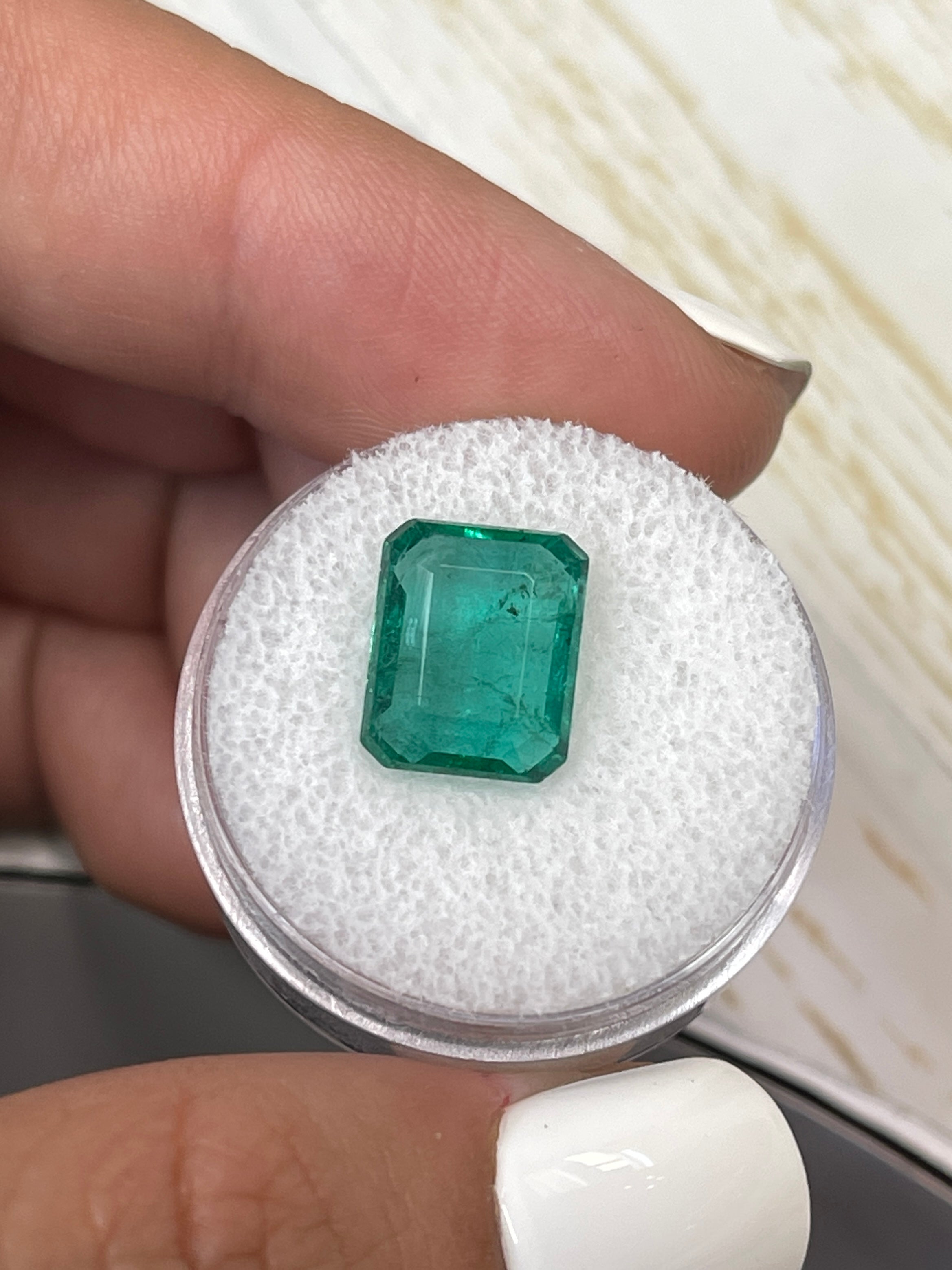 Bluish green 5.16 carat natural Zambian emerald cut loose gemstone from JR Colombian Emeralds.