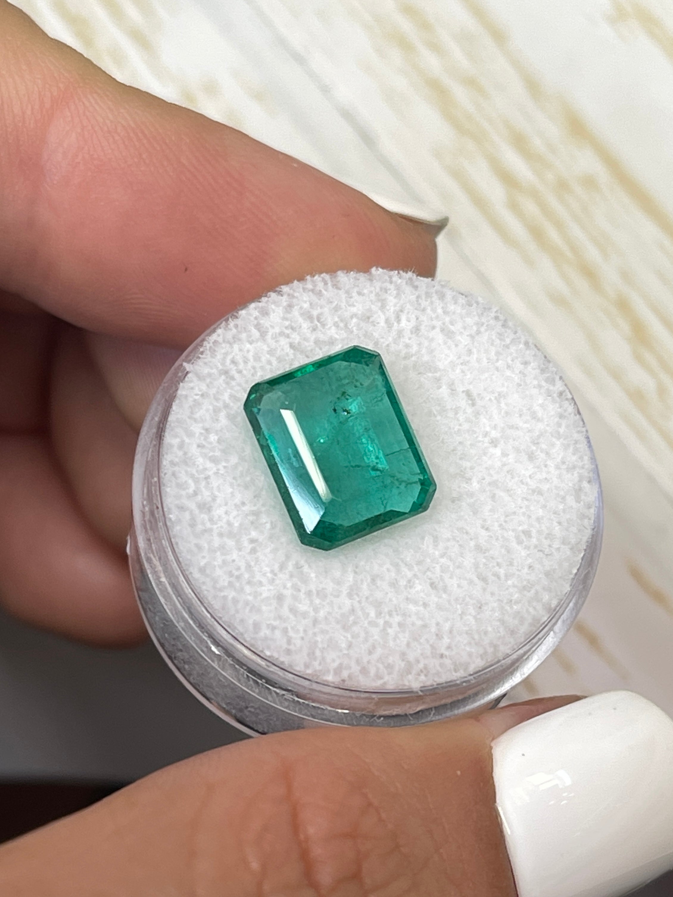 Bluish green natural Zambian emerald cut loose diamond, 5.16 carats, 11.5x9 mm, from JR Colombian Emeralds.