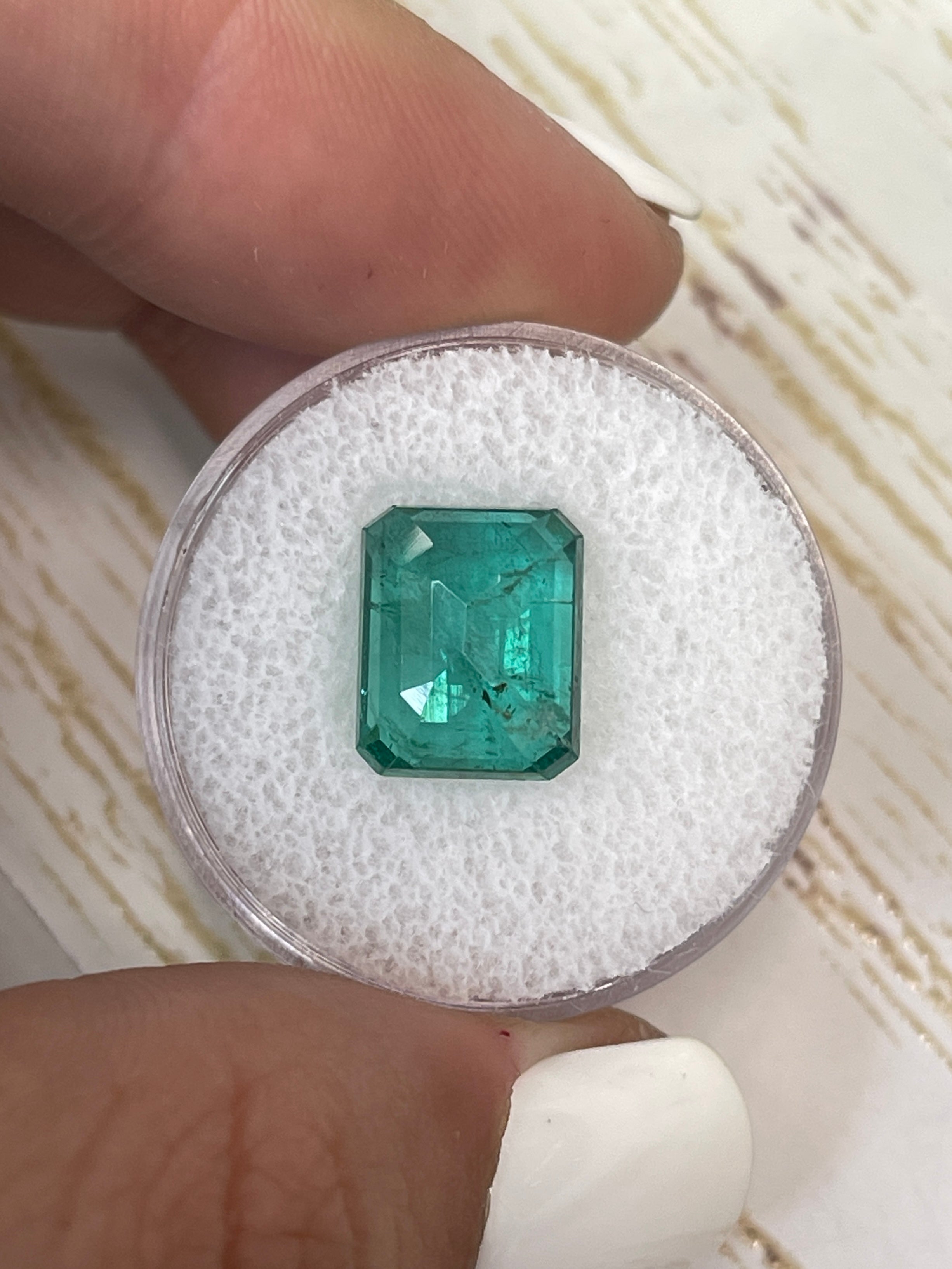 Bluish green 5.16 carat natural Zambian emerald cut loose gemstone by JR Colombian Emeralds.