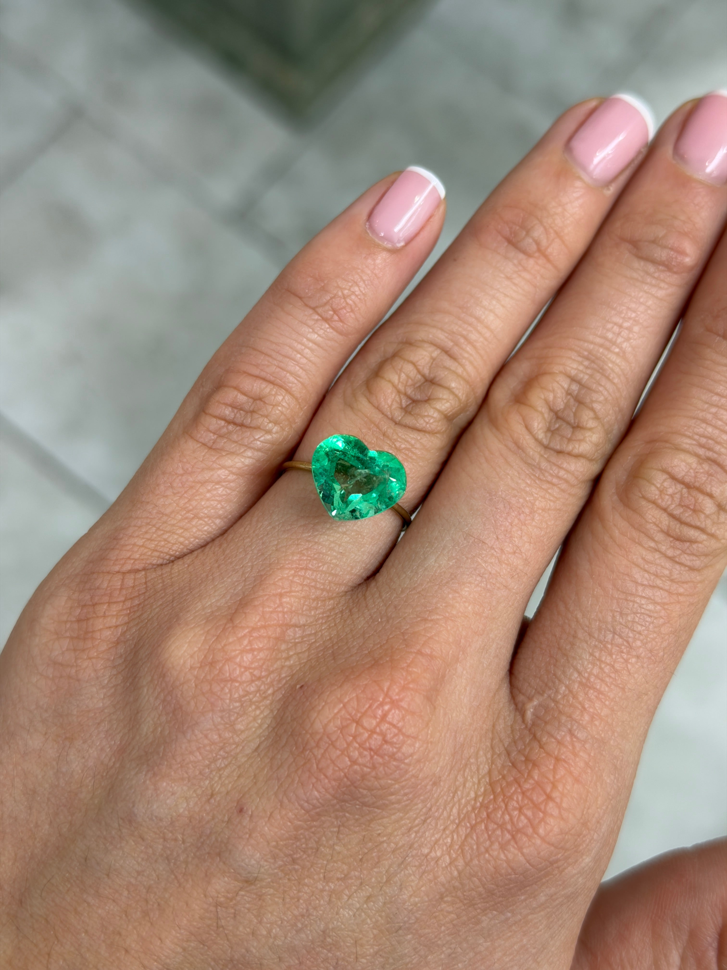 Natural 5.19 Carat 10x12mm electric green Colombian emerald loose heart cut by JR Colombian Emeralds