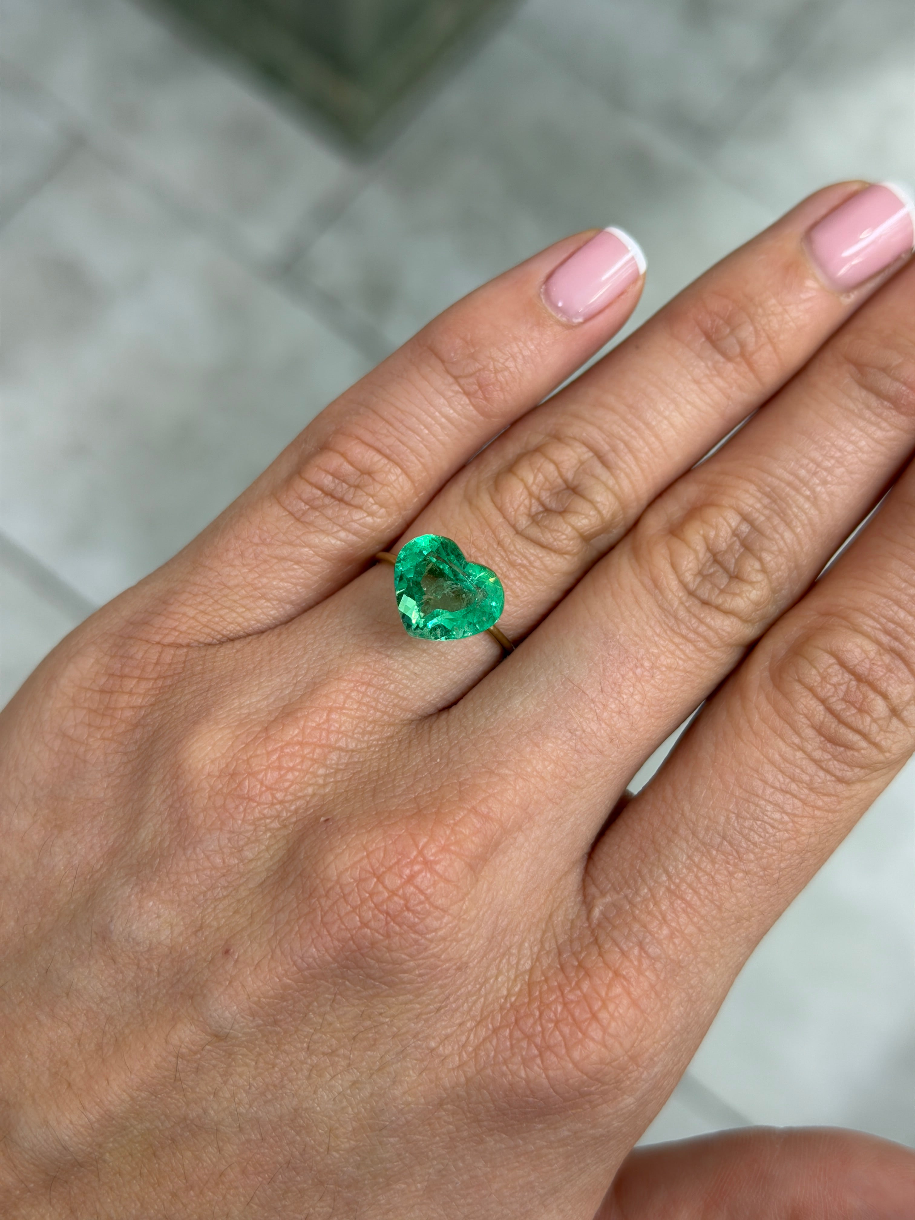 Natural loose Colombian emerald, 5.19 carats, 10x12mm, electric green, heart cut, from JR Colombian Emeralds.