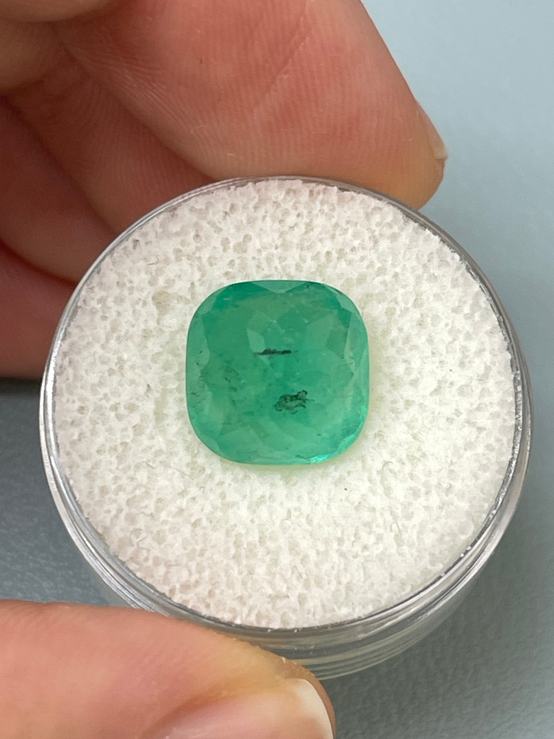 Natural 5.33 carat earthy Colombian emerald loose cushion cut gemstone from JR Colombian Emeralds.
