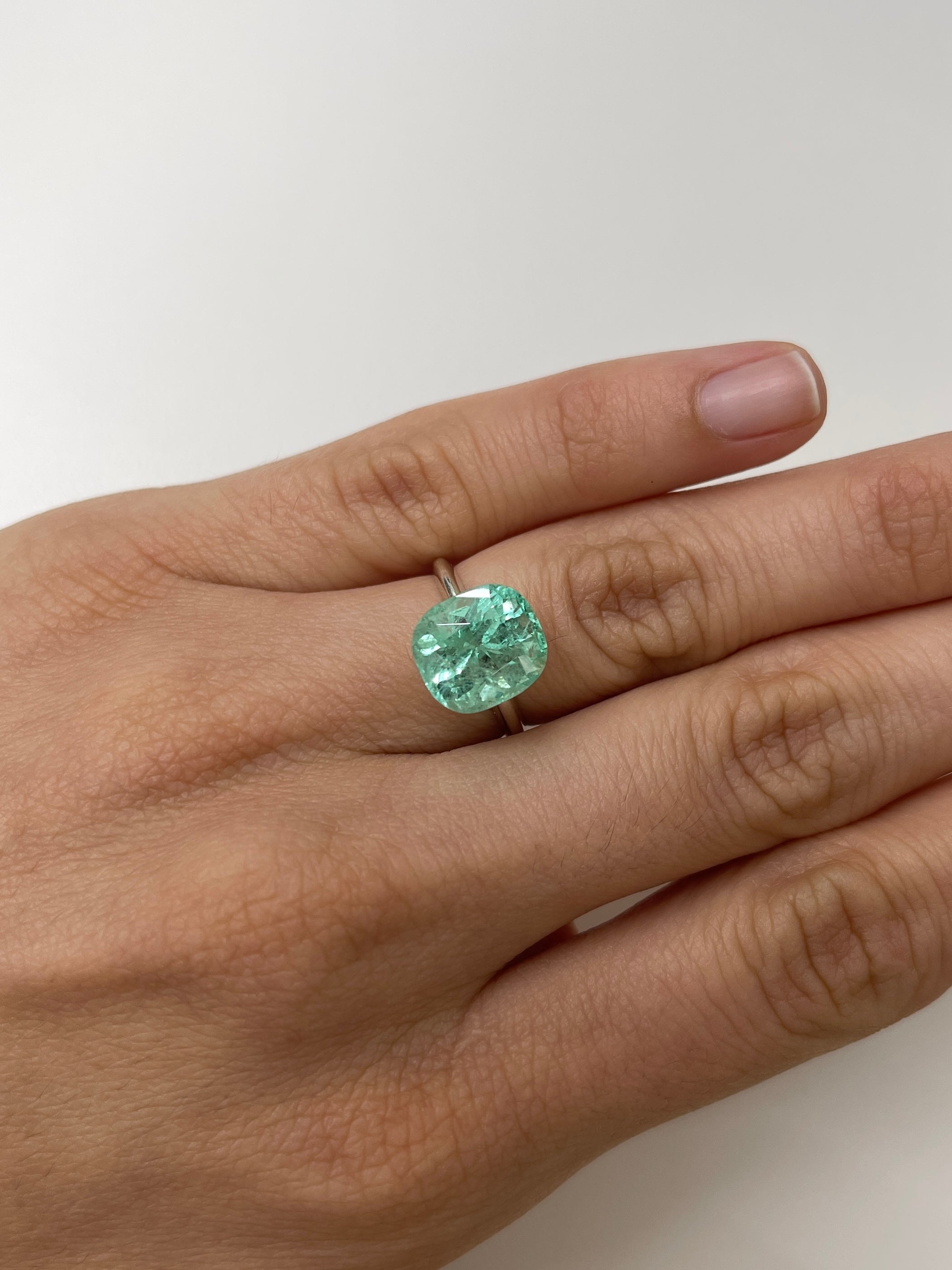 Seafoam green 5.38 carat natural Colombian emerald in cushion cut, loose gemstone from JR Colombian Emeralds.