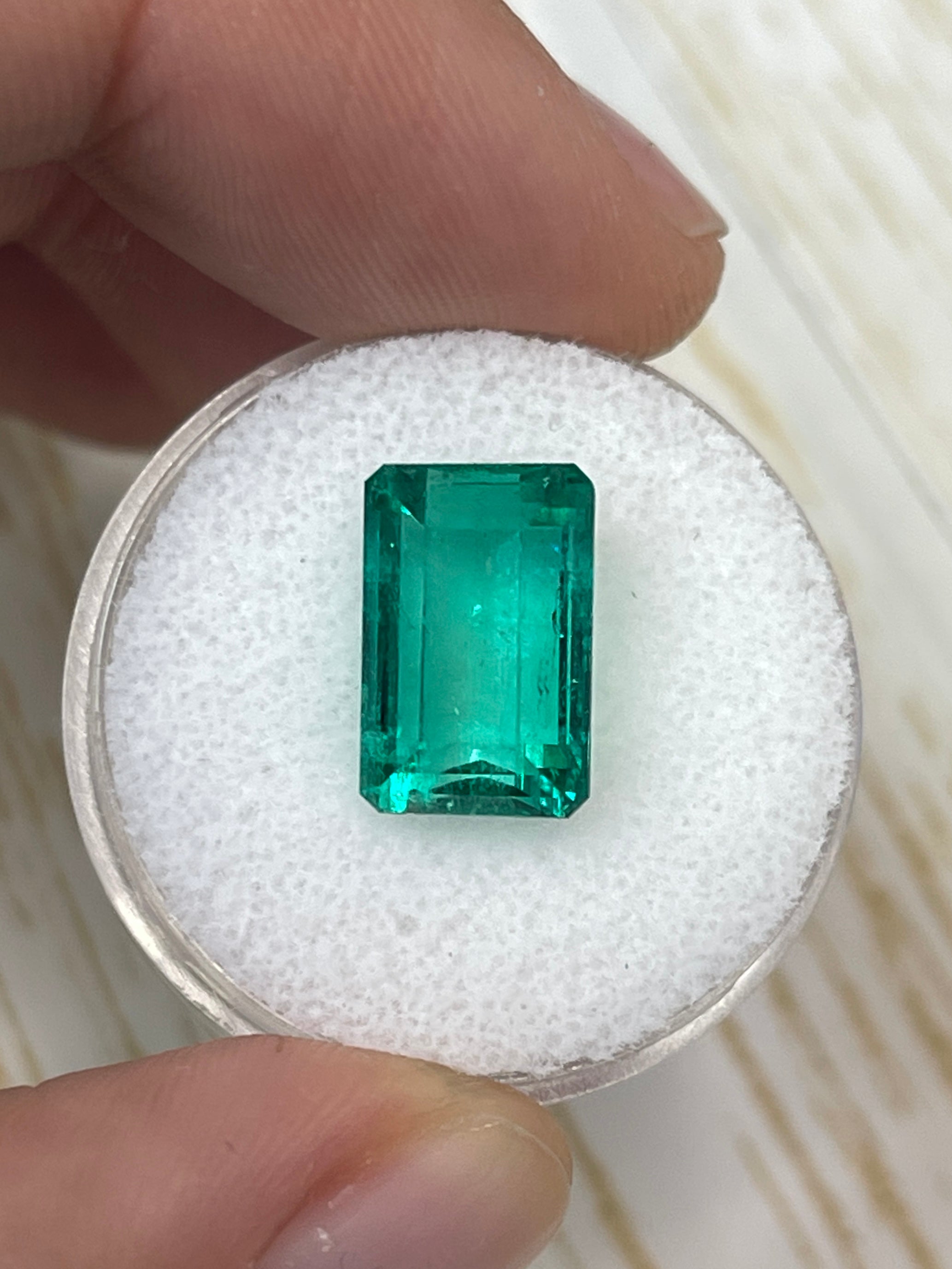 5.63 carat 13x8mm VS bluish green natural Colombian emerald loose gemstone with emerald cut, from JR Colombian Emeralds