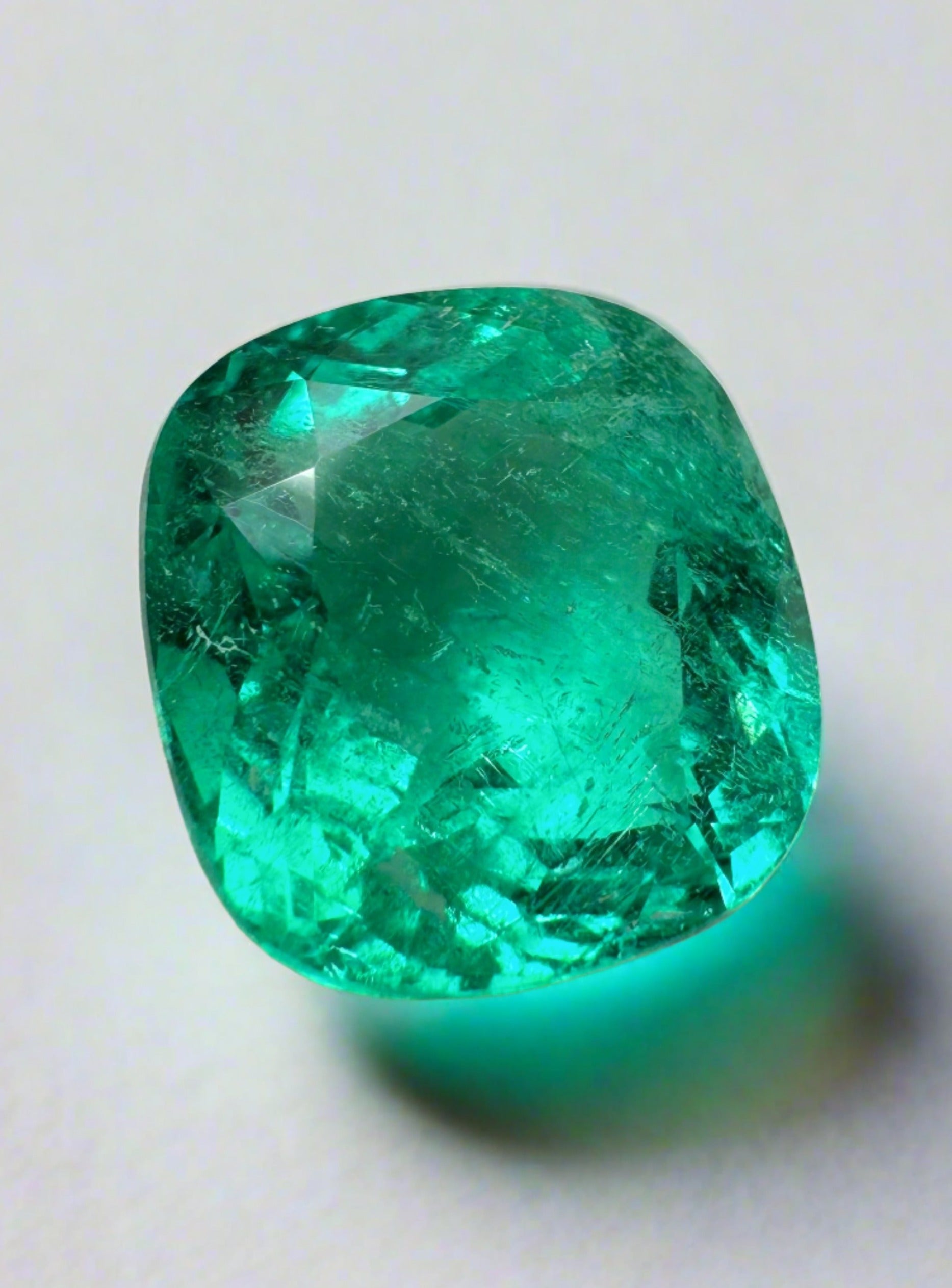 Certified 5.80 carat bluish green Colombian emerald in cushion cut, natural loose gemstone from JR Colombian Emeralds.