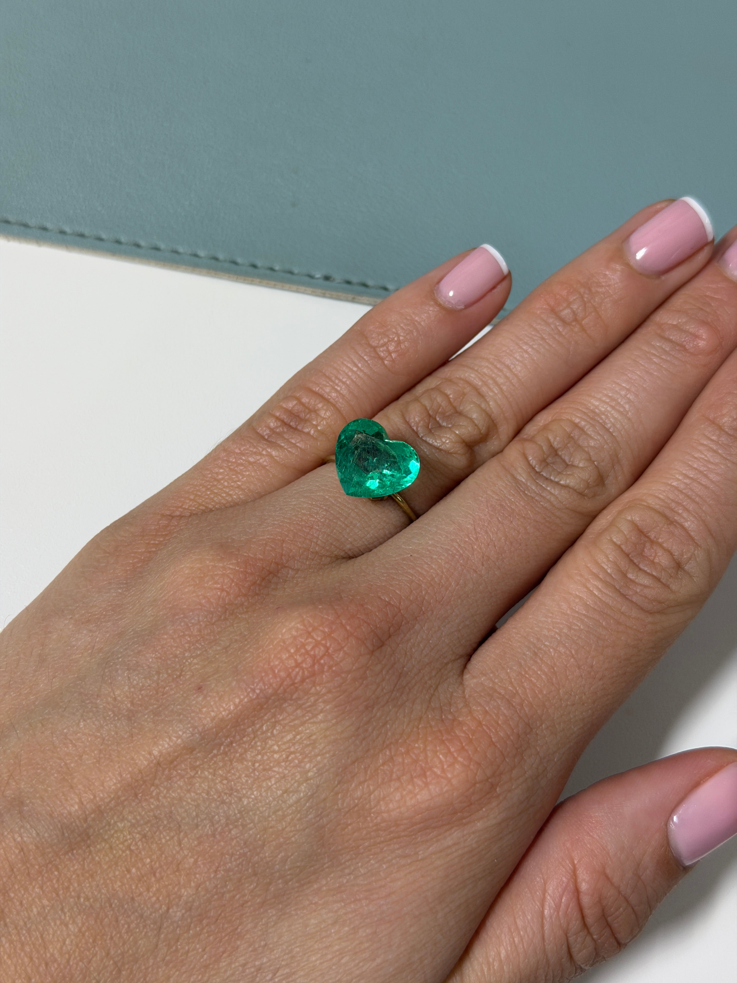 Natural 5.87 carat green Colombian emerald loose gemstone, heart cut, vivid color, from JR Colombian Emeralds.