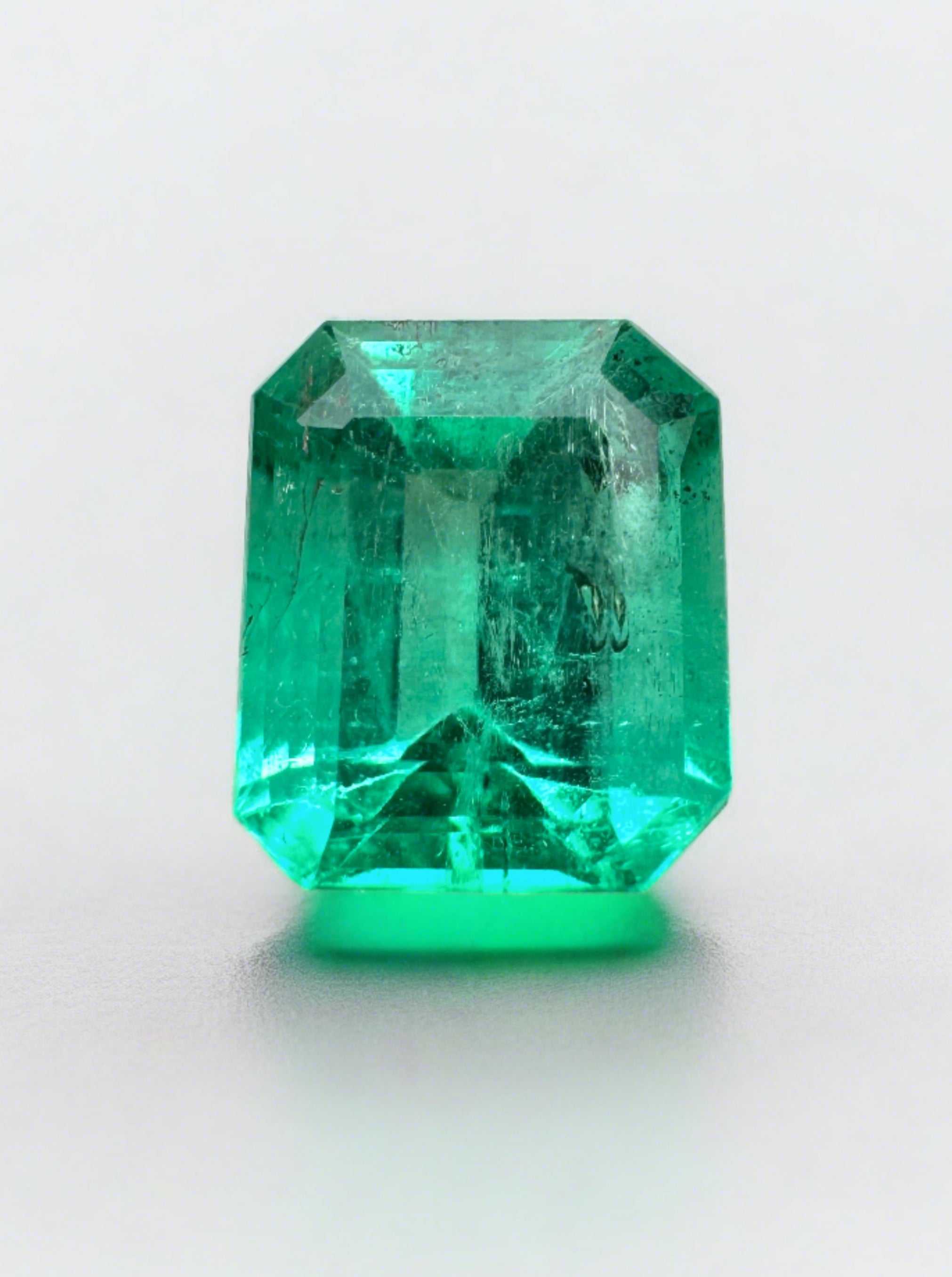 1.69 Carat bright bluish green Colombian emerald in emerald cut, loose gemstone from JR Colombian Emeralds.