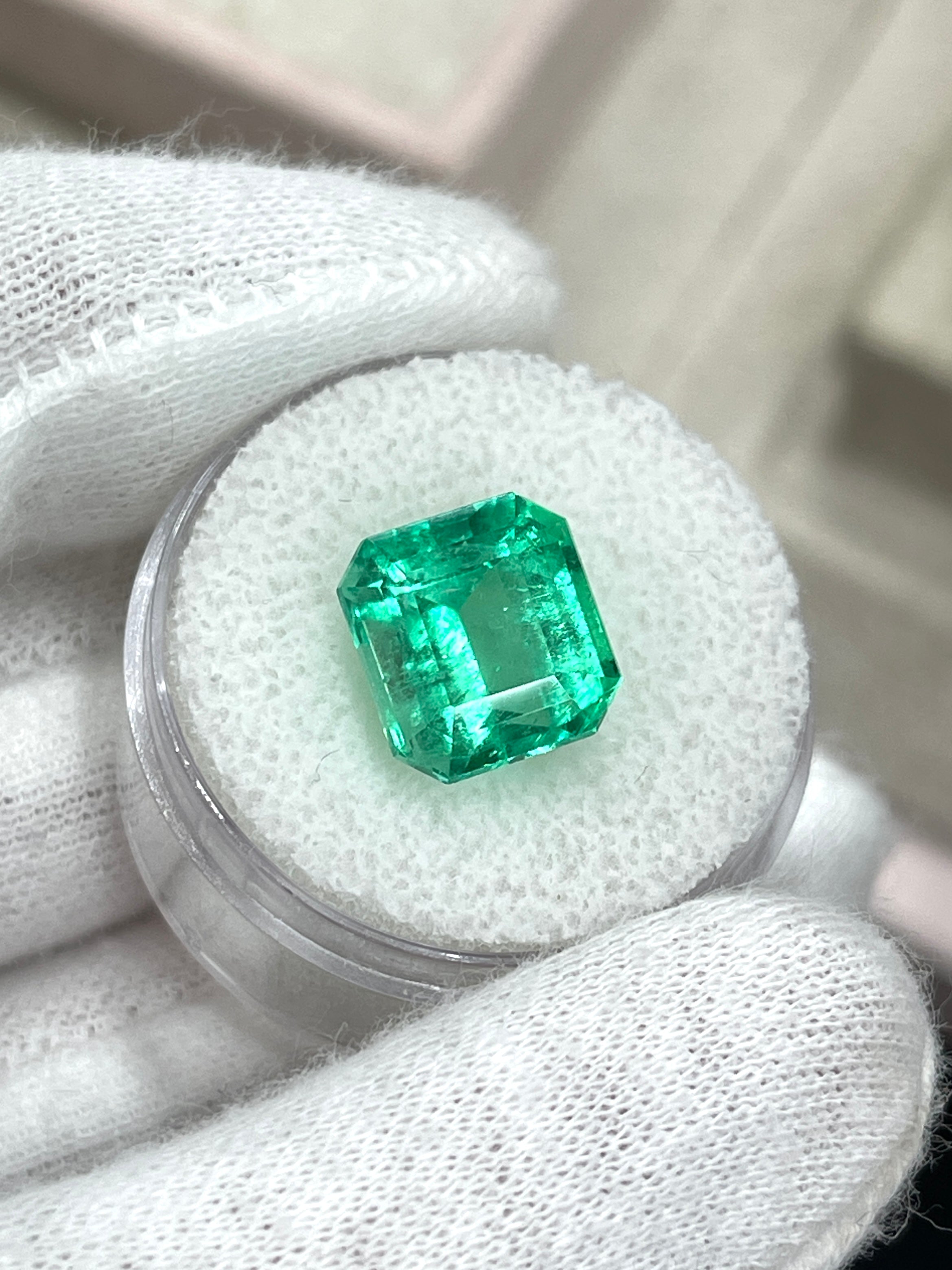 Yellowish green 6.07 carat Colombian emerald loose gemstone with Asscher cut, natural and radiant from JR Colombian Emeralds.