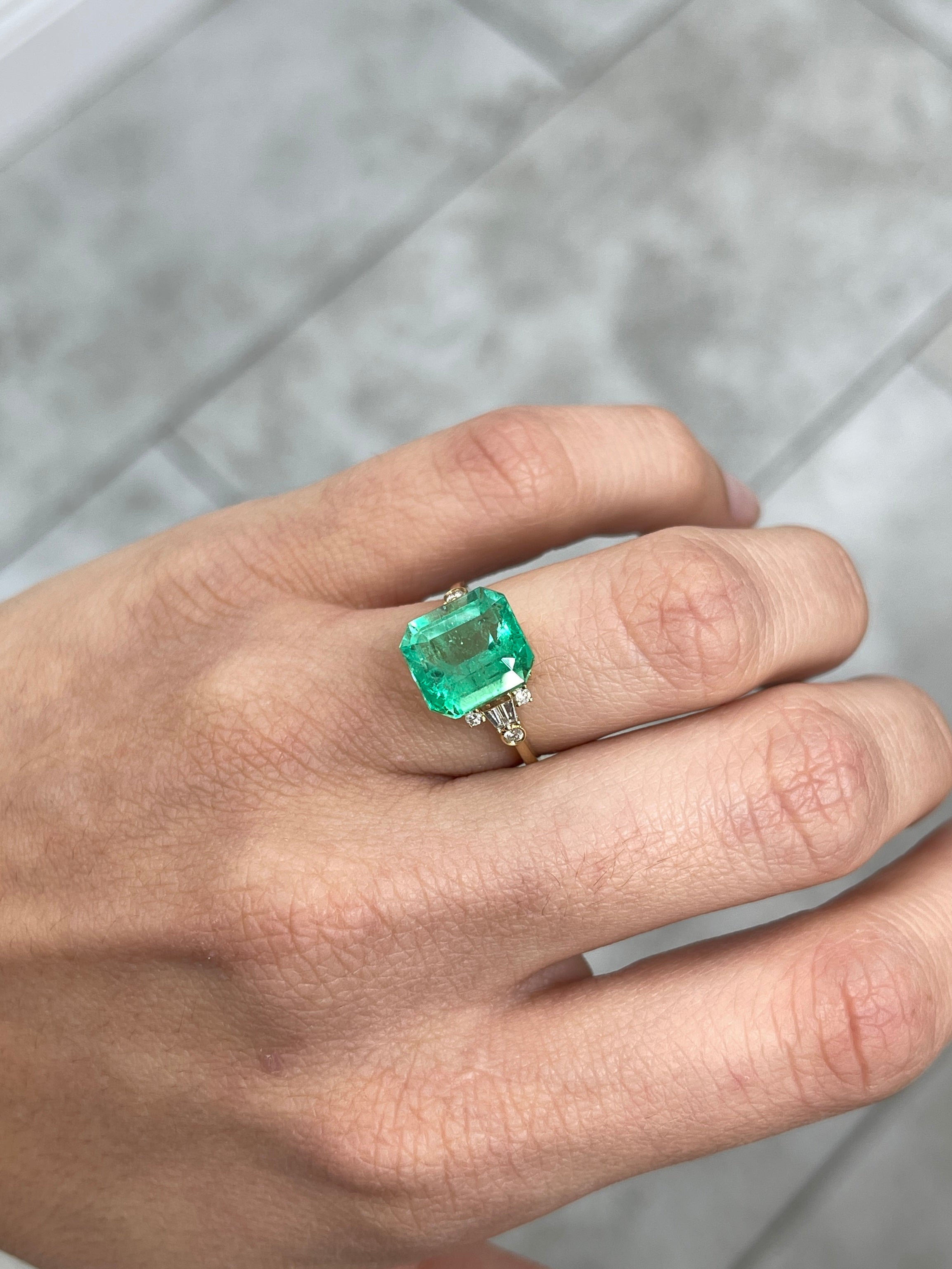 6.07 carat yellowish green natural Colombian emerald loose gemstone in Asscher cut, from JR Colombian Emeralds.