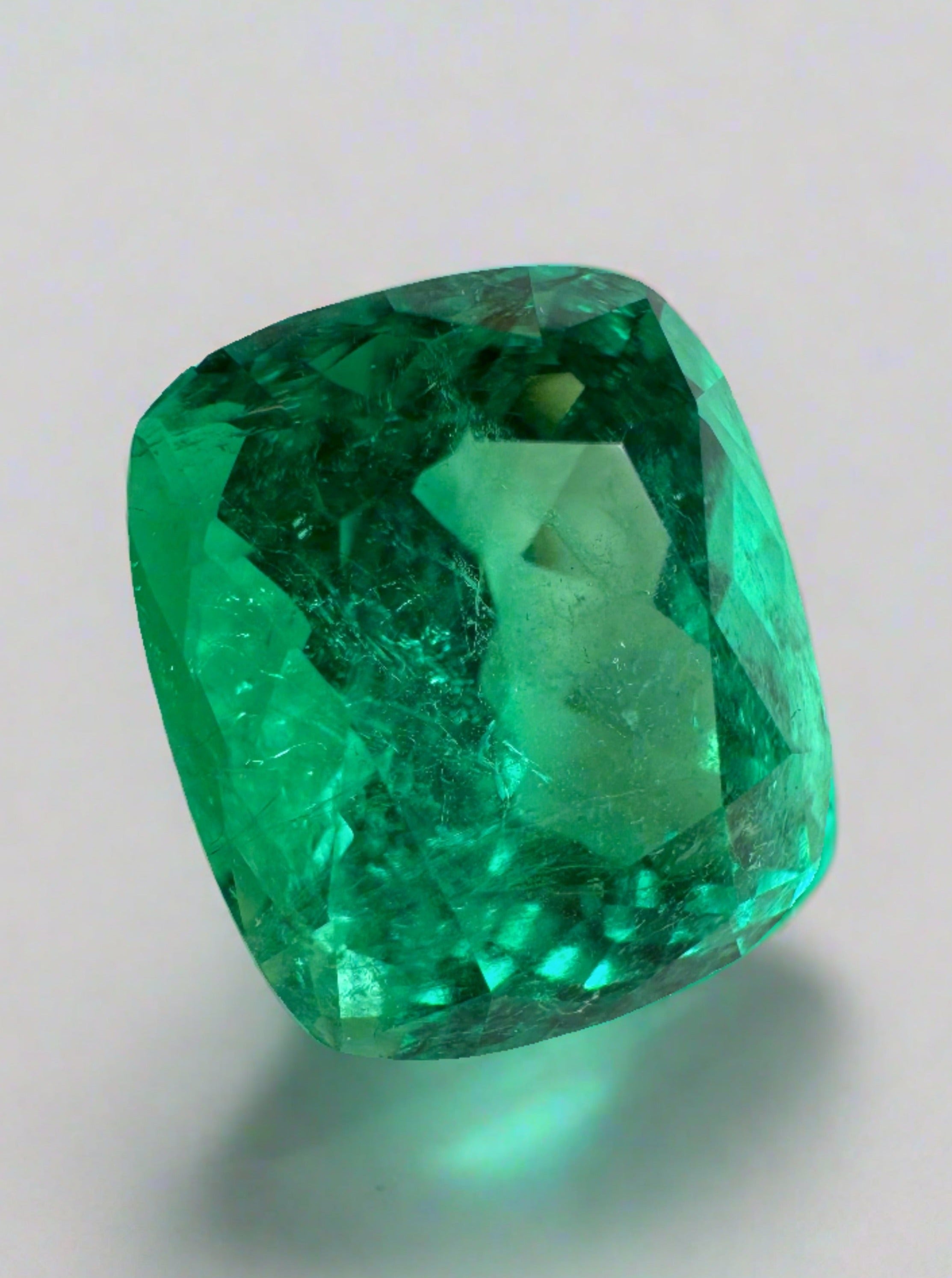 Natural green Colombian emerald loose gemstone, 6.17 carats, cushion cut with minor to moderate oil treatment, from JR Colombian Emeralds.