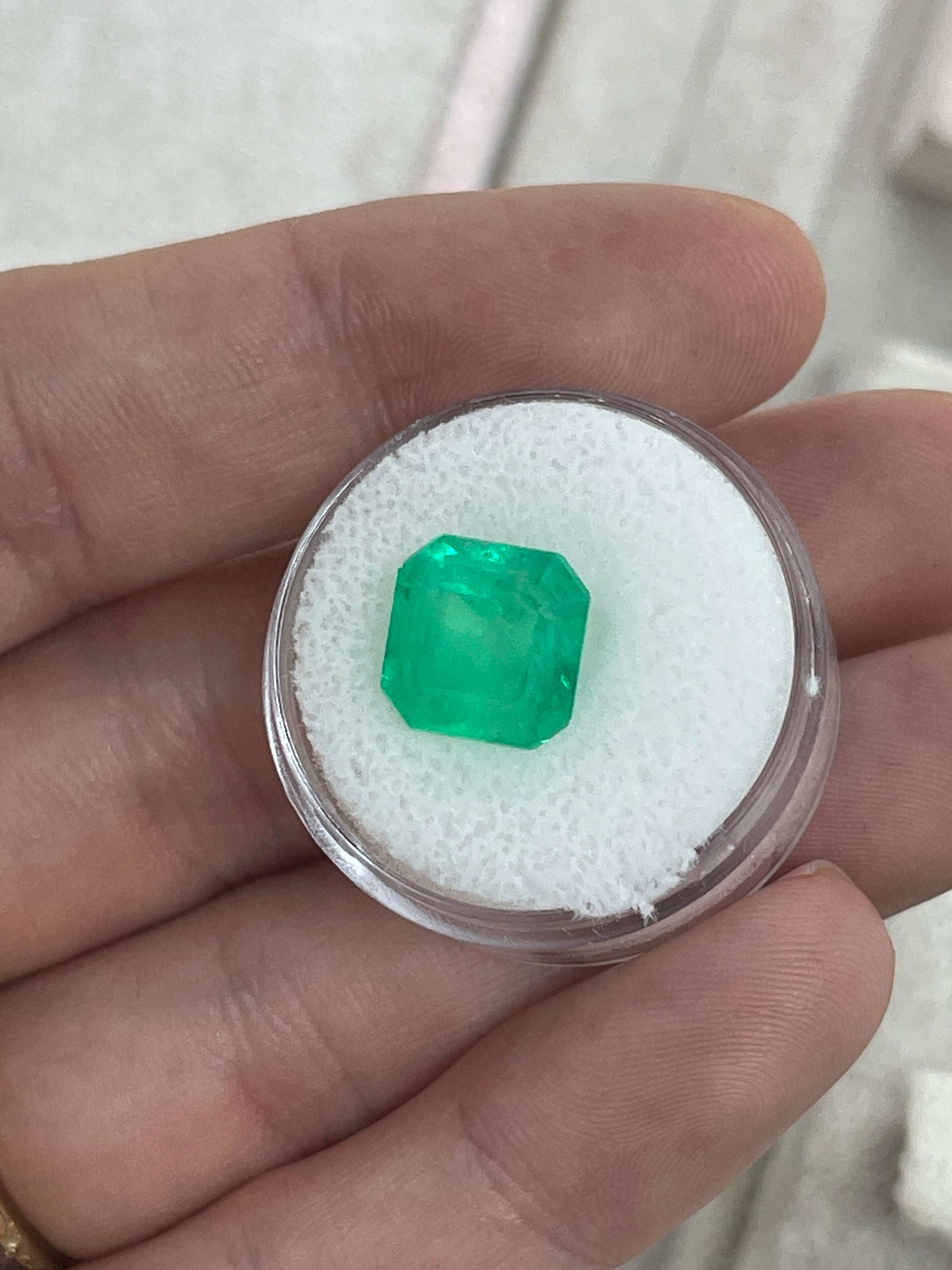 Medium neon yellowish Colombian emerald, 6.19 carats, Asscher cut, loose gemstone from JR Colombian Emeralds.
