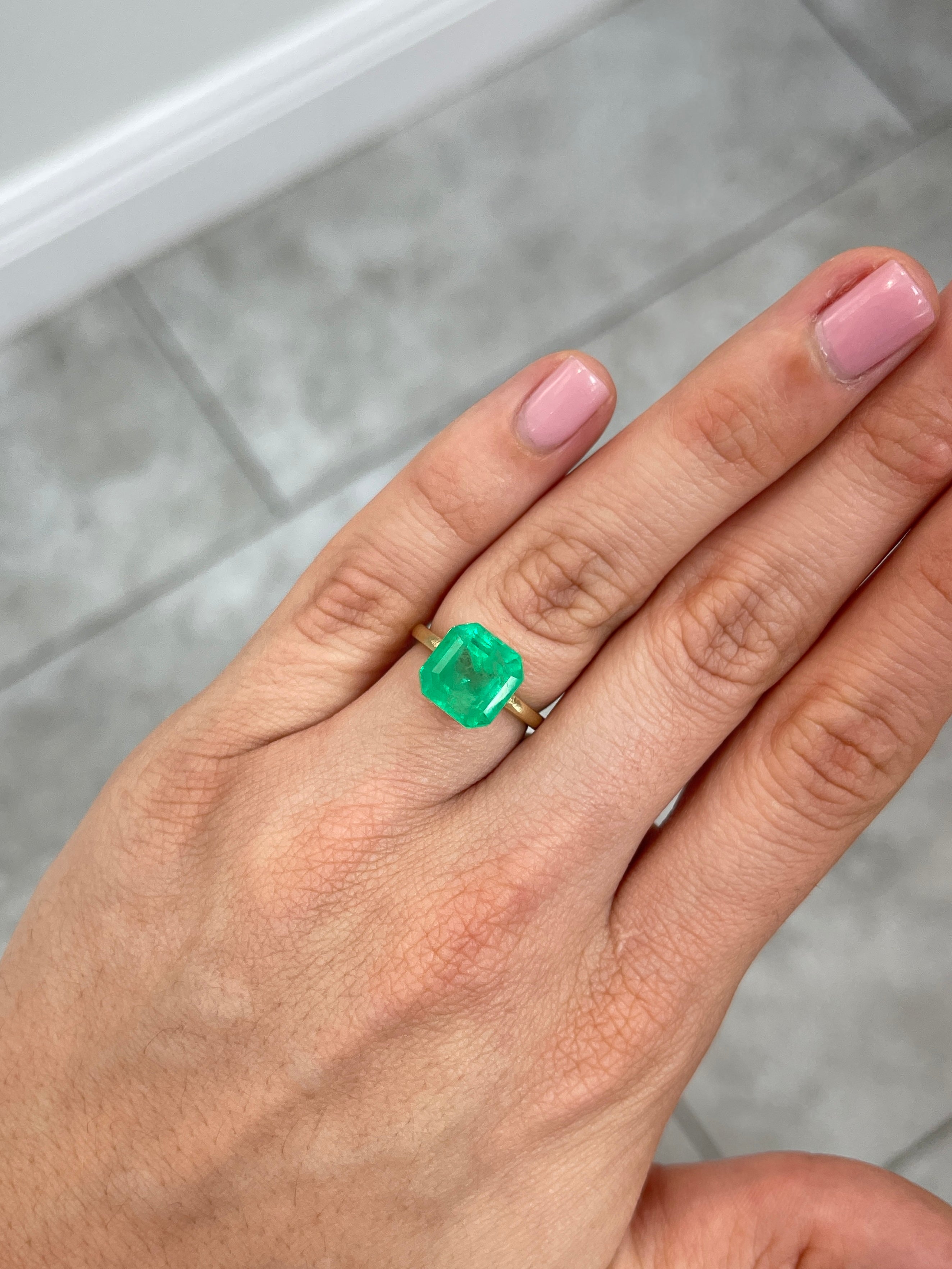 Medium neon yellowish Colombian emerald loose gemstone, 6.19 carats, Asscher cut, from JR Colombian Emeralds.