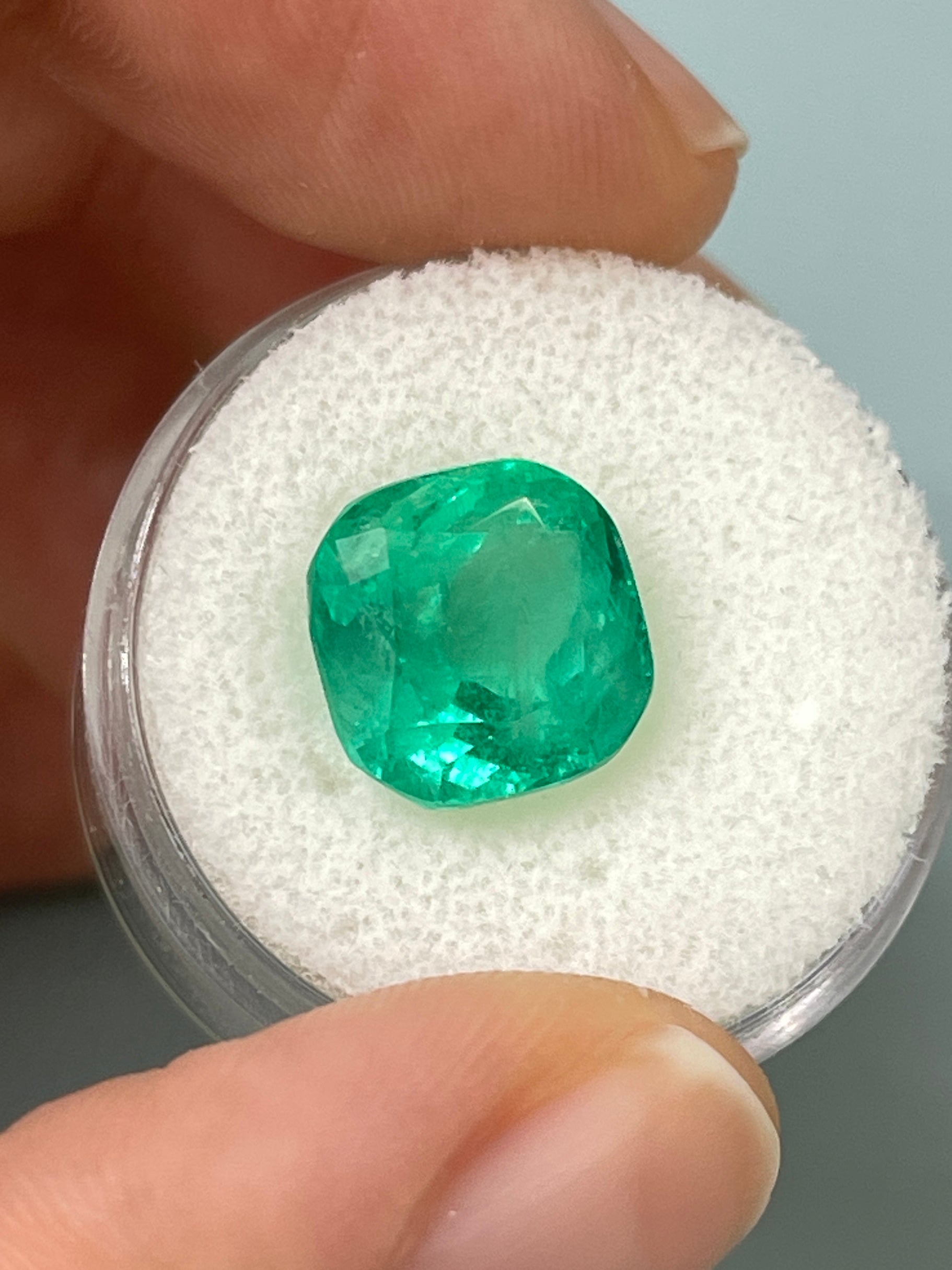 6.25 carat bluish green natural Colombian emerald loose cushion cut gemstone from JR Colombian Emeralds.