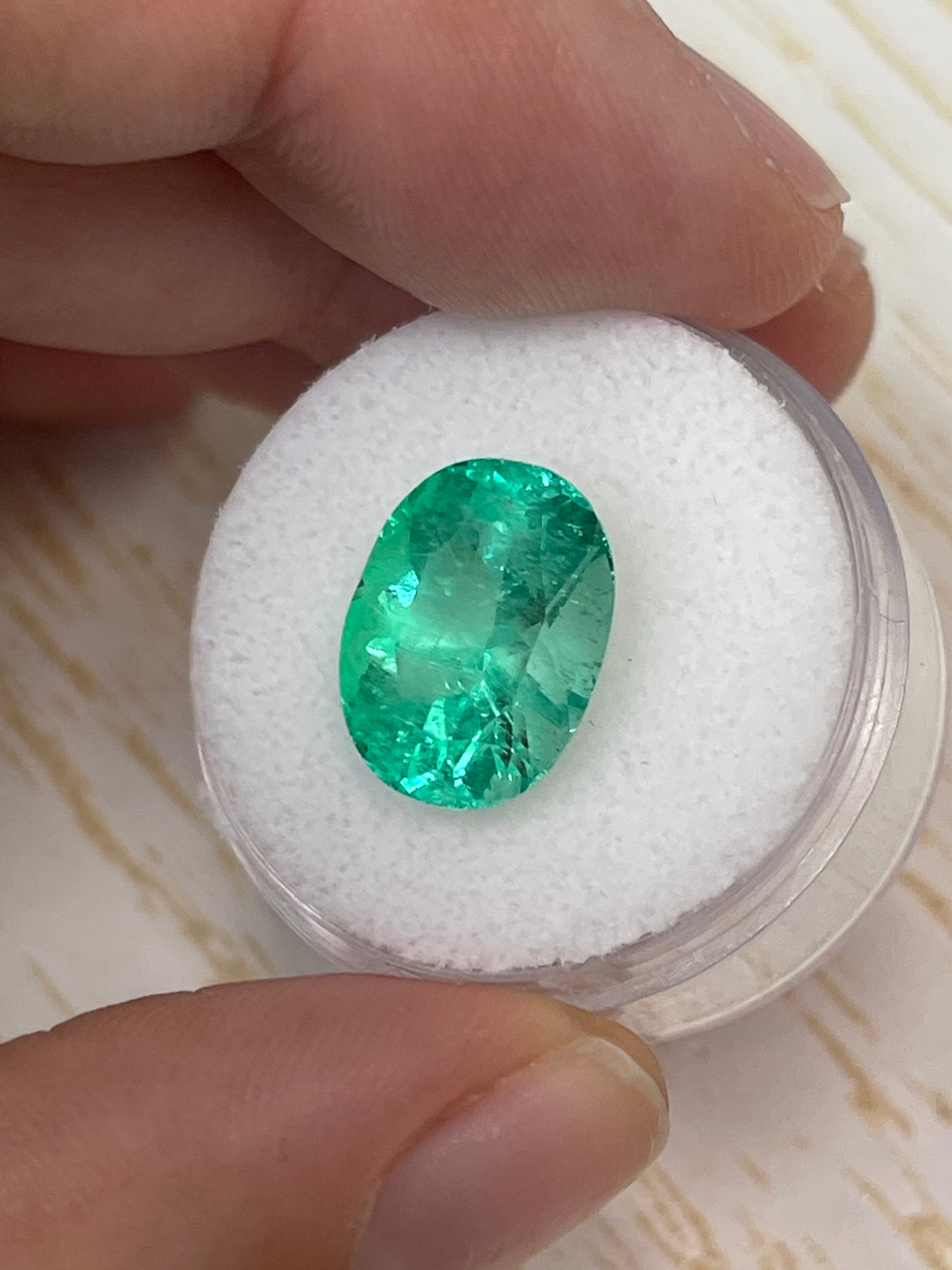 Medium green 6.40 carat natural Colombian emerald loose oval cut gemstone by JR Colombian Emeralds.