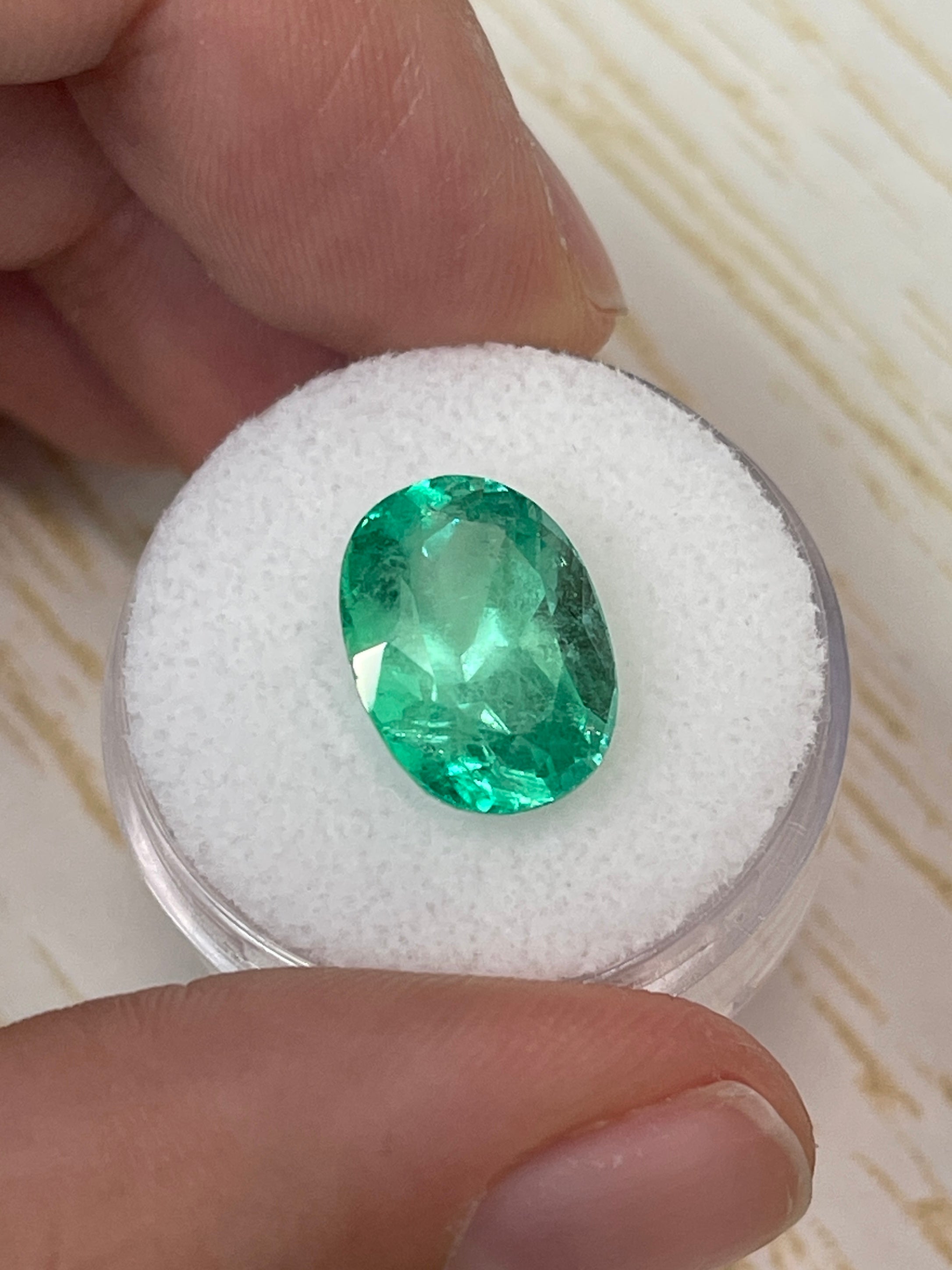 Medium green 6.40 carat natural Colombian emerald loose gemstone with oval cut, from JR Colombian Emeralds.
