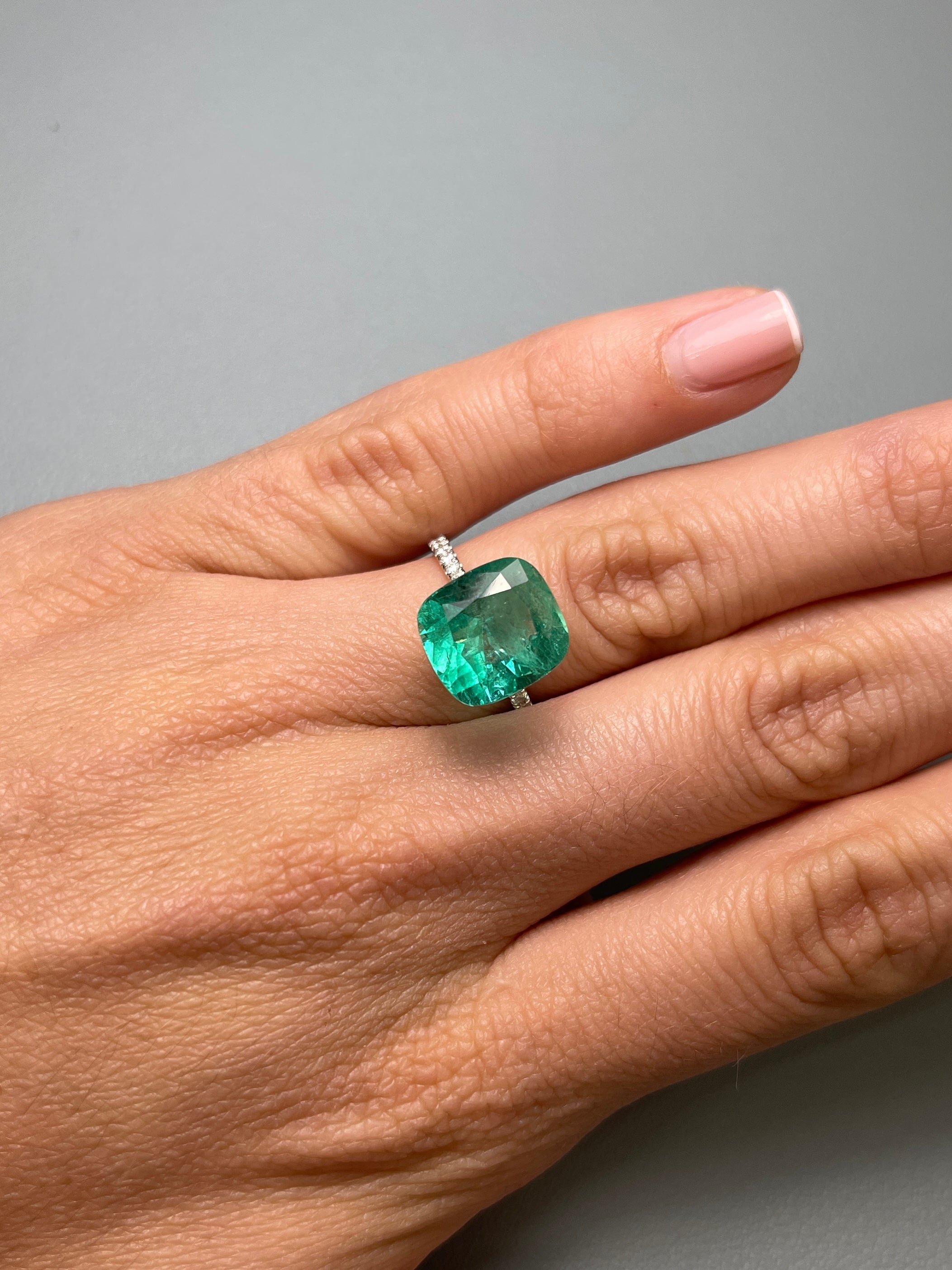 6.65 carat medium bluish-green Colombian emerald loose cushion cut gemstone from JR Colombian Emeralds.