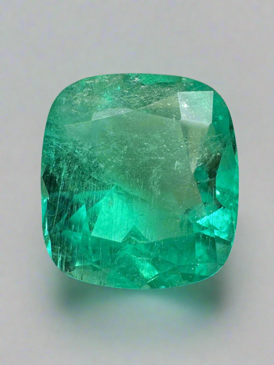 6.65 carat medium bluish green Colombian emerald loose cushion cut gemstone from JR Colombian Emeralds.