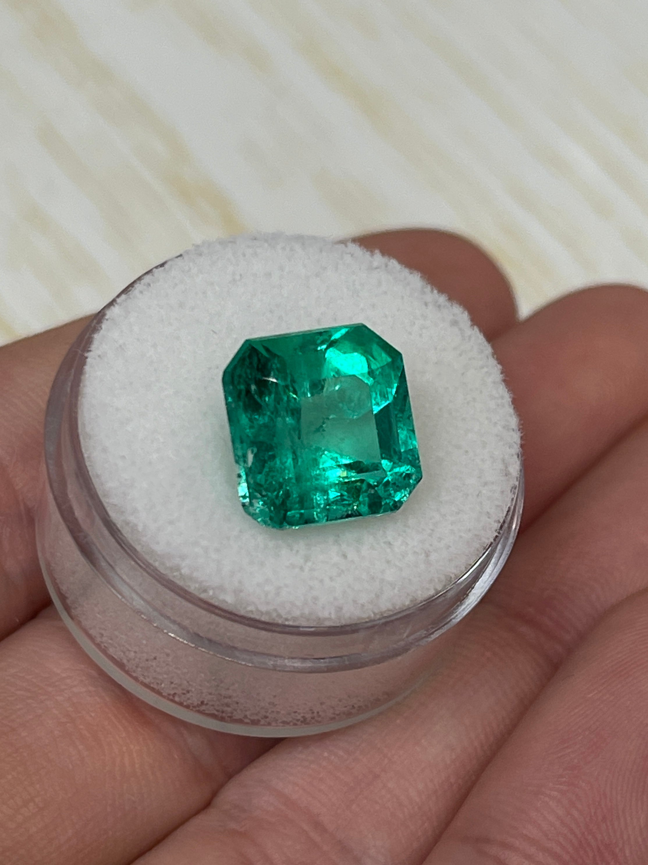 Vivid Muzo green Colombian emerald loose gemstone 11.5x11.5 mm Asscher cut, 6.69 carats, from JR Colombian Emeralds.
