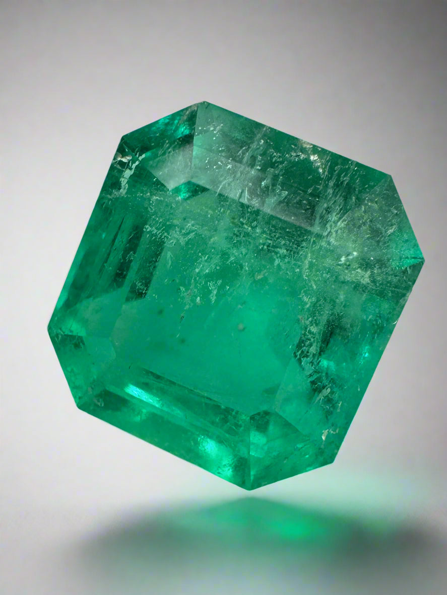 Medium green 6.93 carat Colombian emerald in Asscher cut, natural loose gemstone from JR Colombian Emeralds.