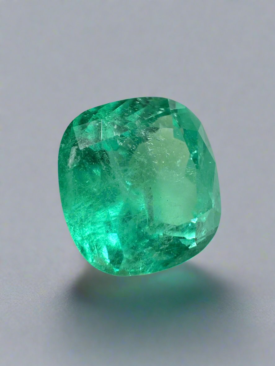 Medium bluish green 7.28 carat Colombian emerald in cushion cut, natural loose gemstone from JR Colombian Emeralds.