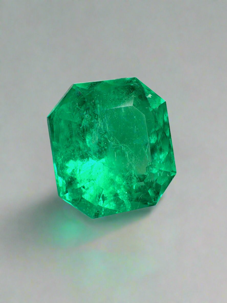 7.37 carat Muzo intense green Colombian emerald loose Asscher cut gemstone from JR Colombian Emeralds.