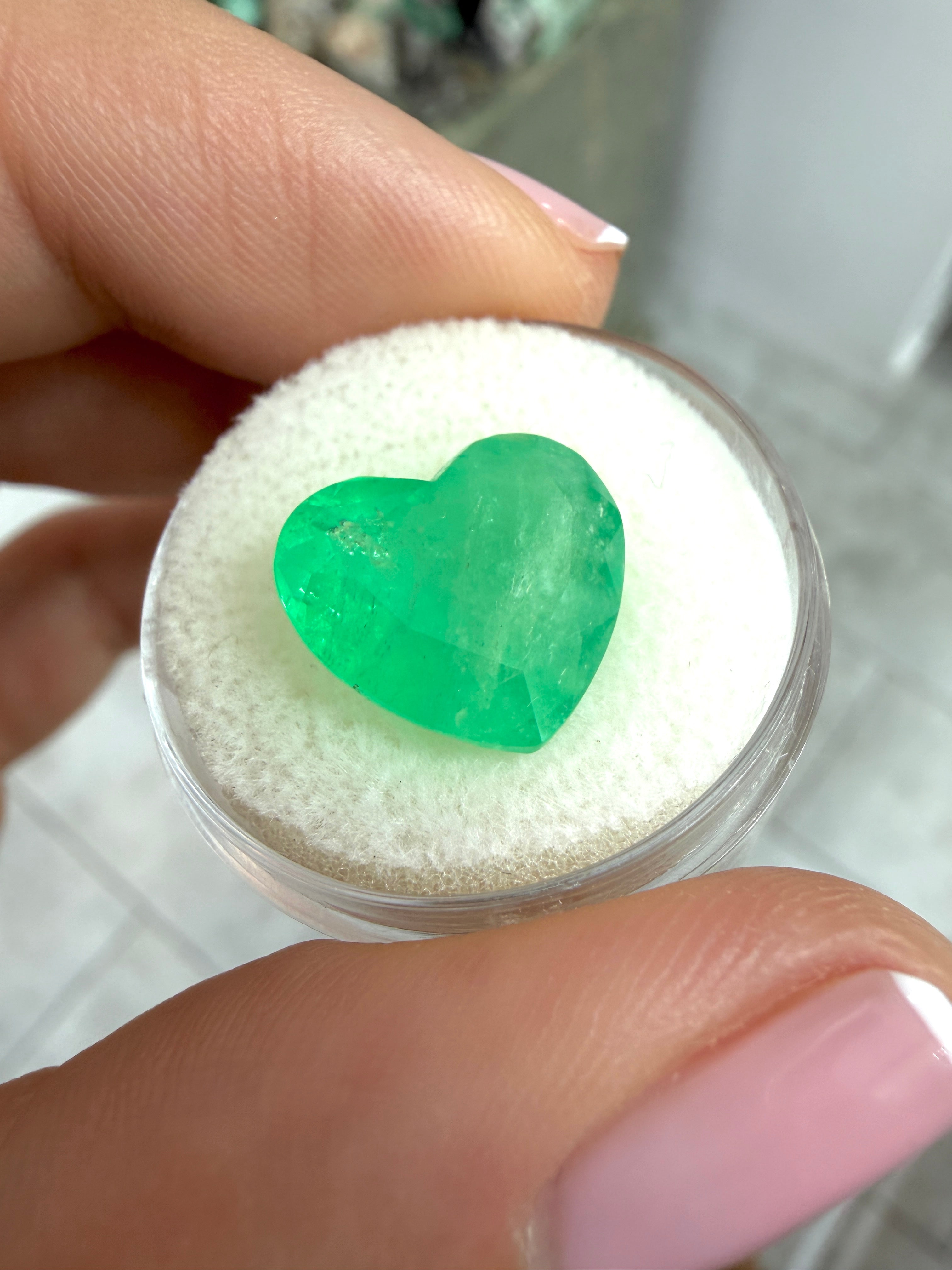 Natural 7.68 carat earthy green Colombian emerald in heart cut, loose gemstone from JR Colombian Emeralds.