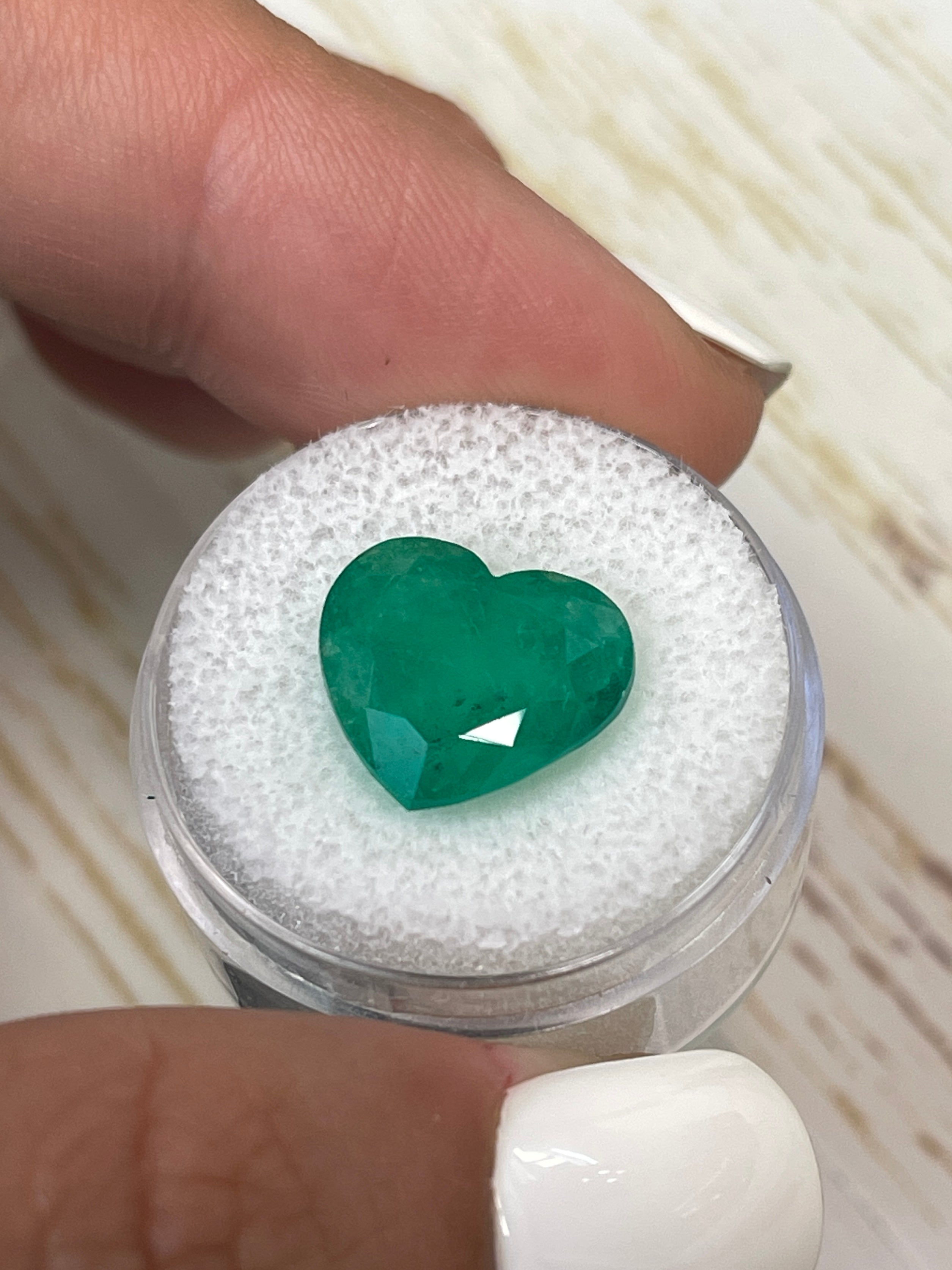 7.68 carat natural Colombian emerald, heart cut, forest green color, loose gemstone from JR Colombian Emeralds.
