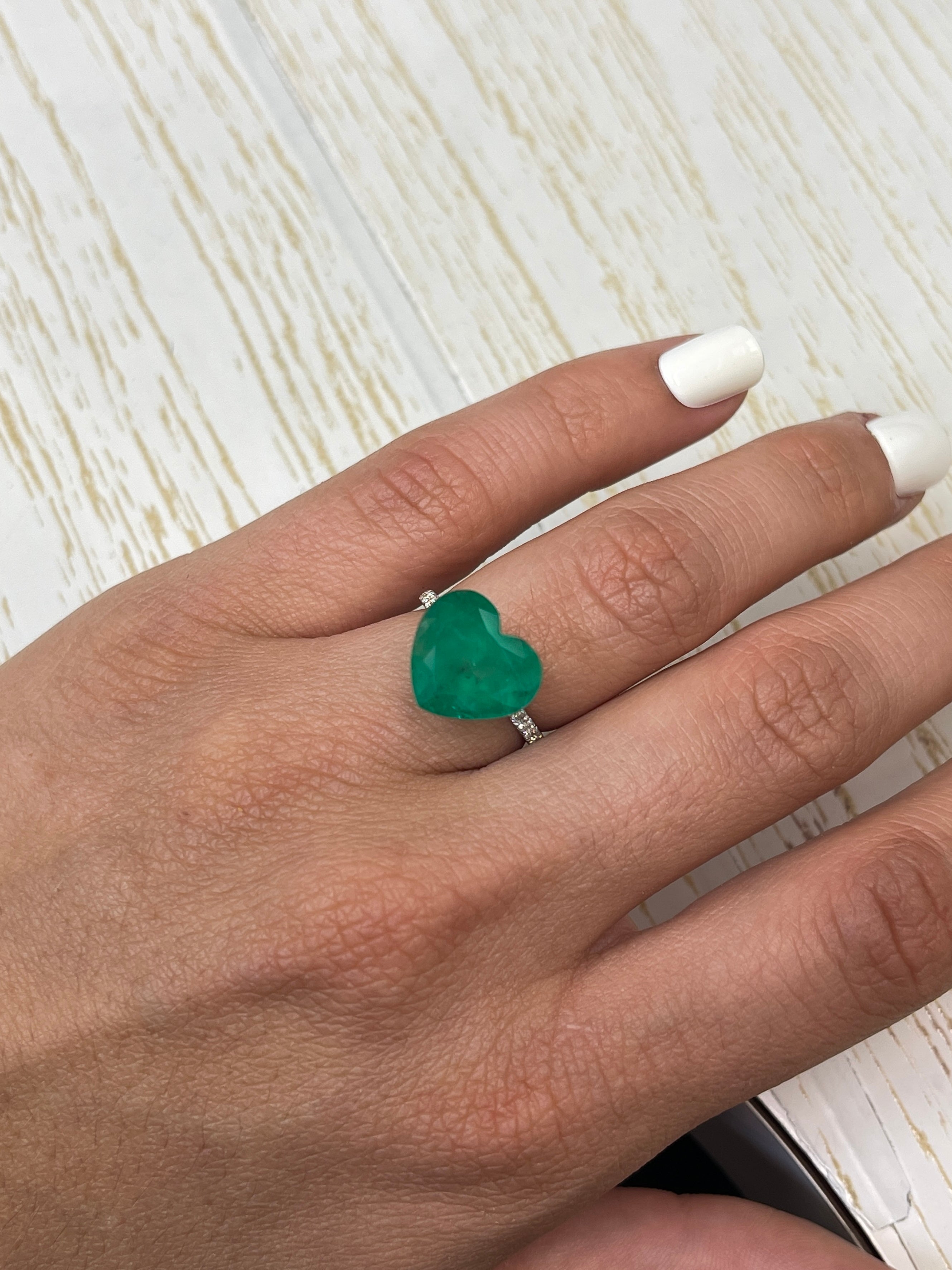 Forest green 7.68 carat natural Colombian emerald in heart cut, loose gemstone from JR Colombian Emeralds.