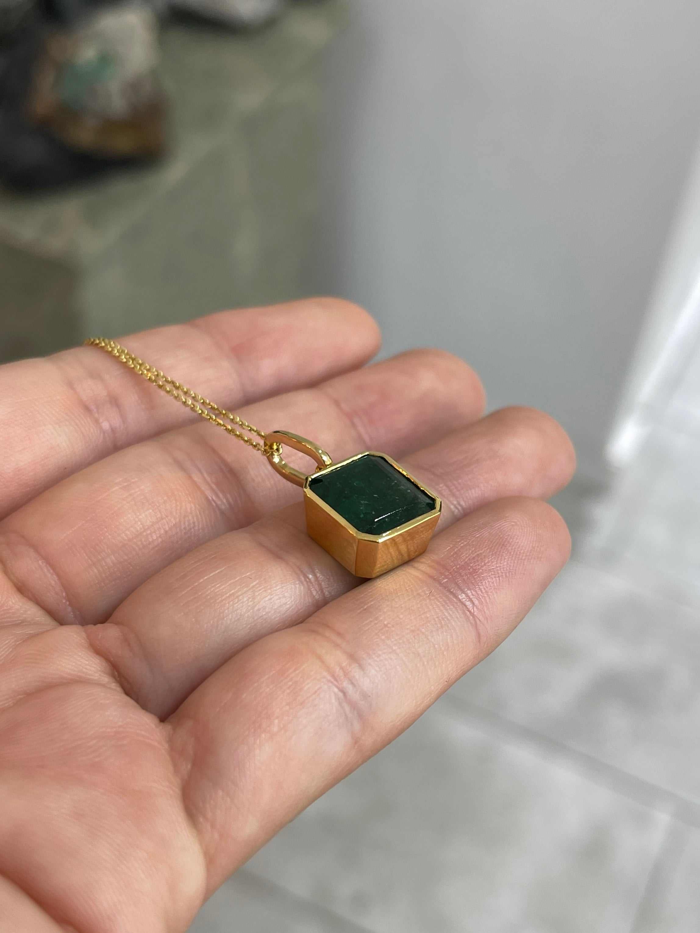 Dark green Zambian emerald necklace with 7.79 carats bezel set in 14K gold by JR Colombian Emeralds.
