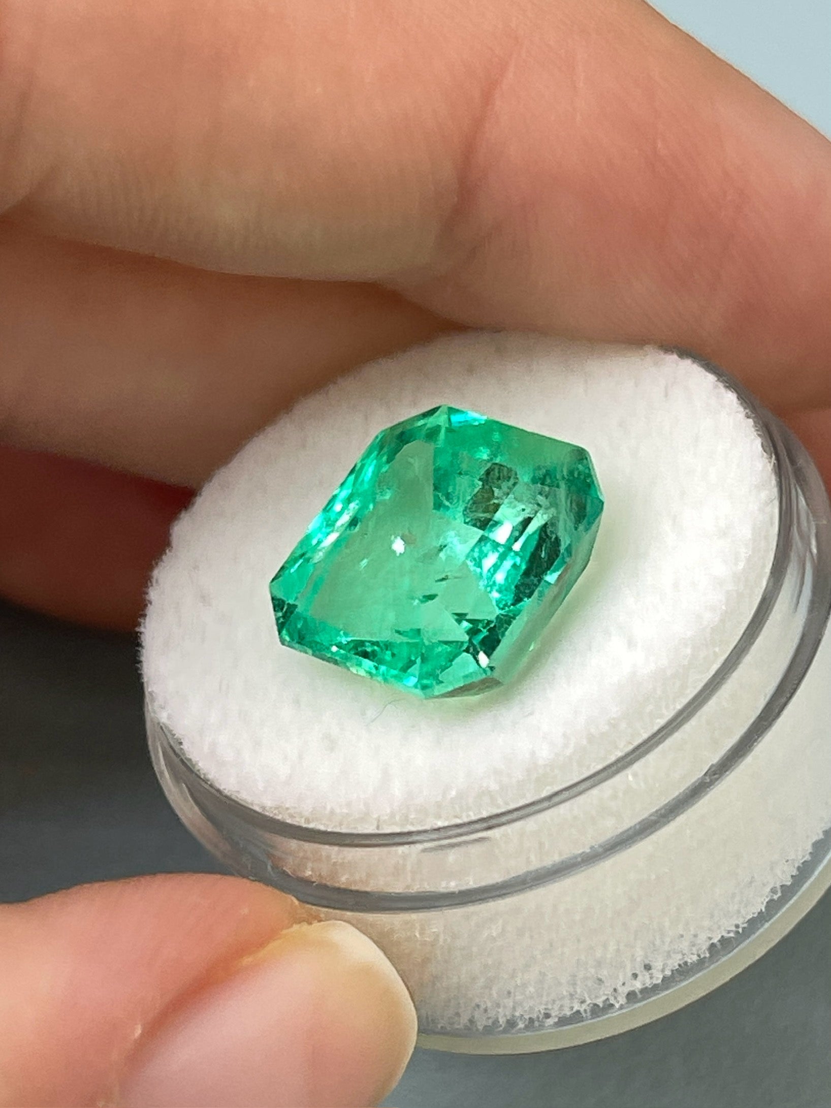 Green natural Colombian emerald loose gemstone, 8.01 carats, Asscher cut, lustrous and vibrant from JR Colombian Emeralds.