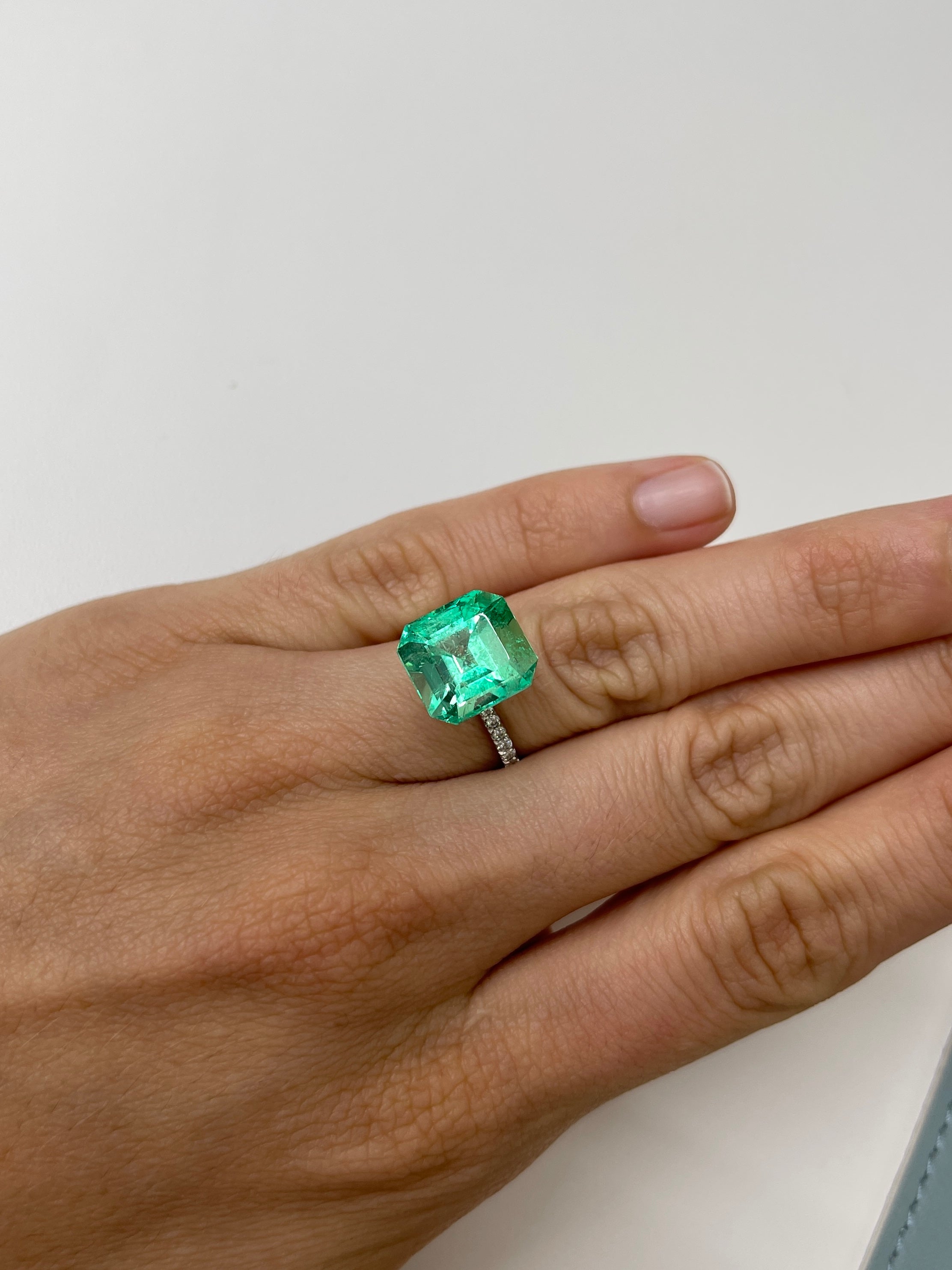 Lusterous green 8.01 carat natural Colombian emerald loose gemstone in Asscher cut, 12.5x11.5mm size, by JR Colombian Emeralds.