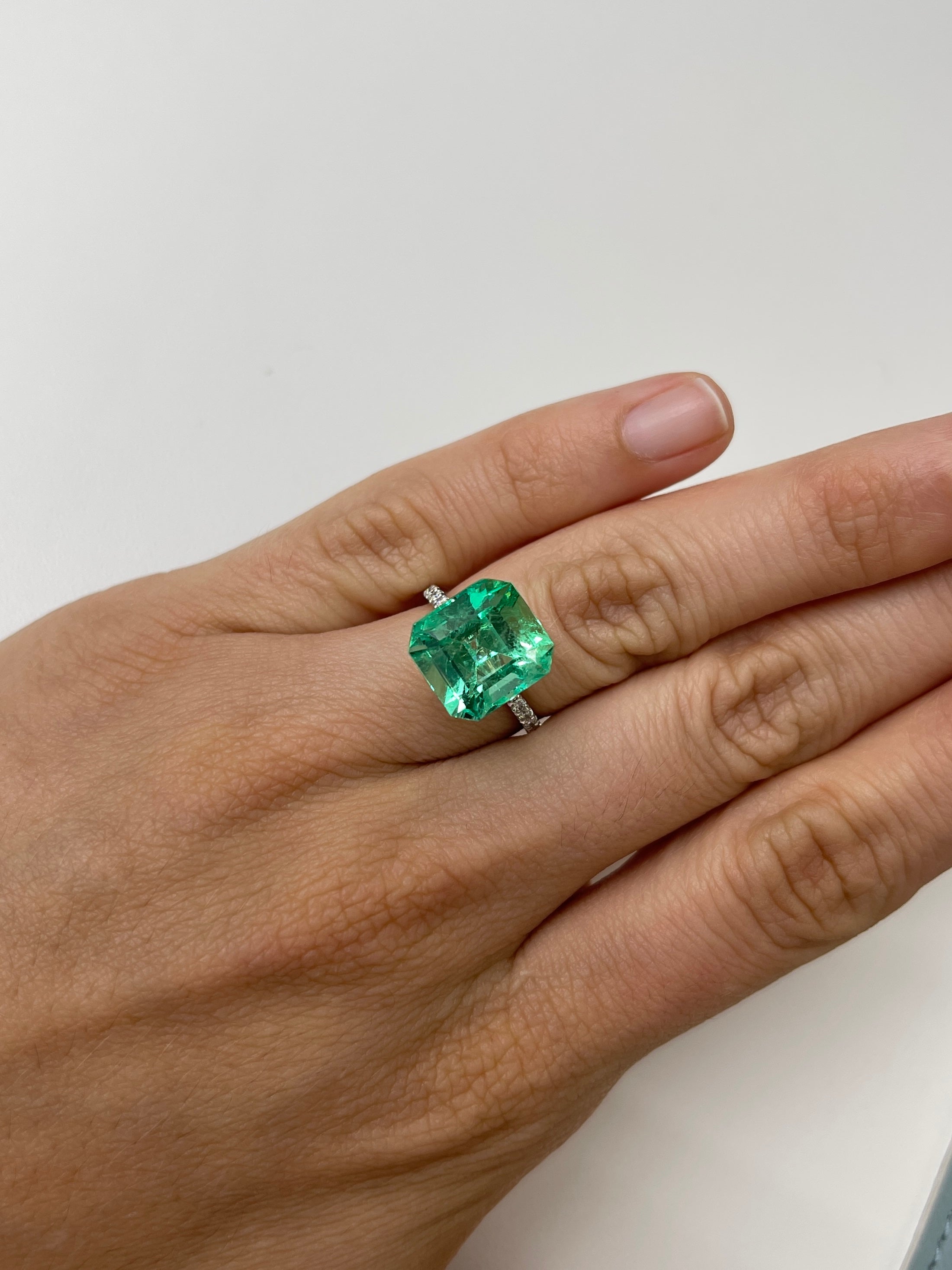 8.01 carat natural Colombian emerald loose gemstone, Asscher cut, vibrant green color, high luster, from JR Colombian Emeralds