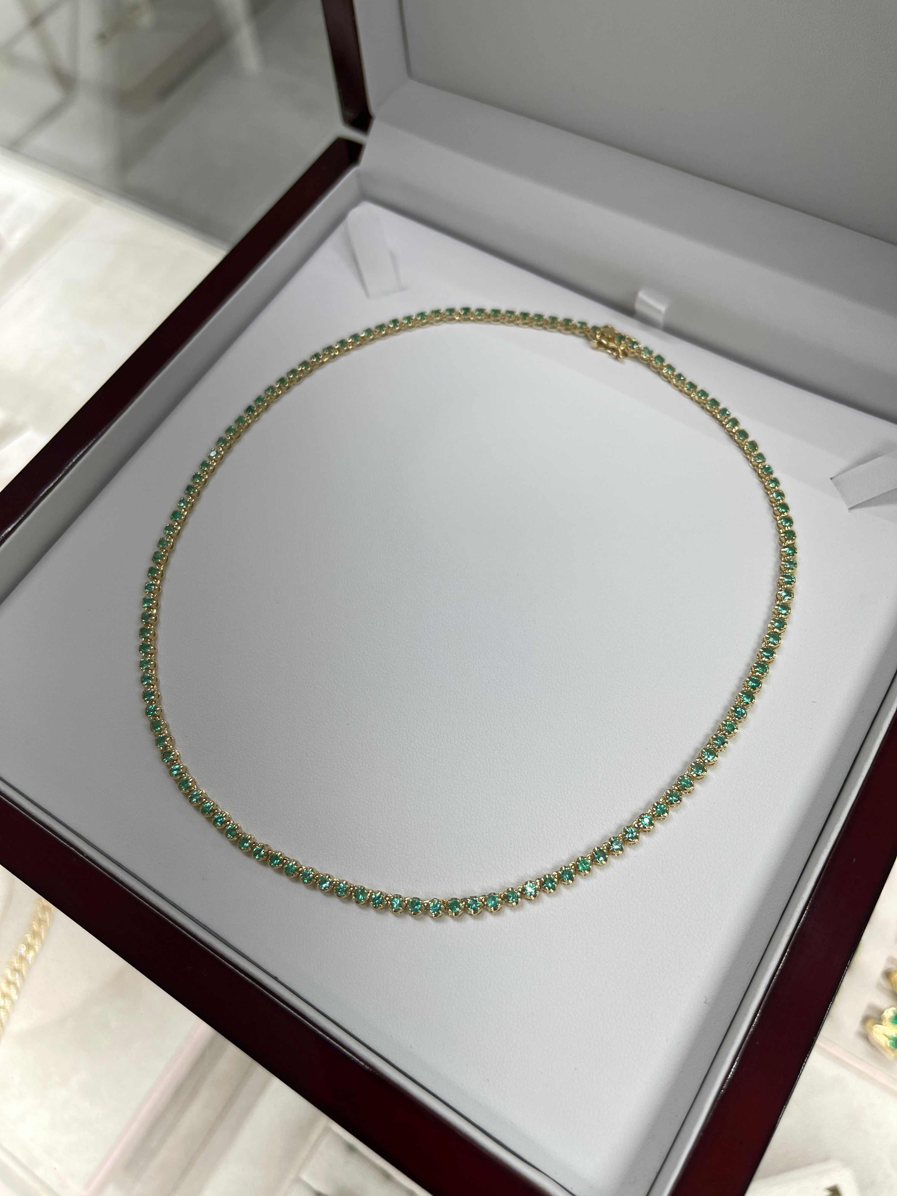 Green emerald round prong tennis necklace by JR Colombian Emeralds, 8.20 tcw, 14K gold, 17-inch length.