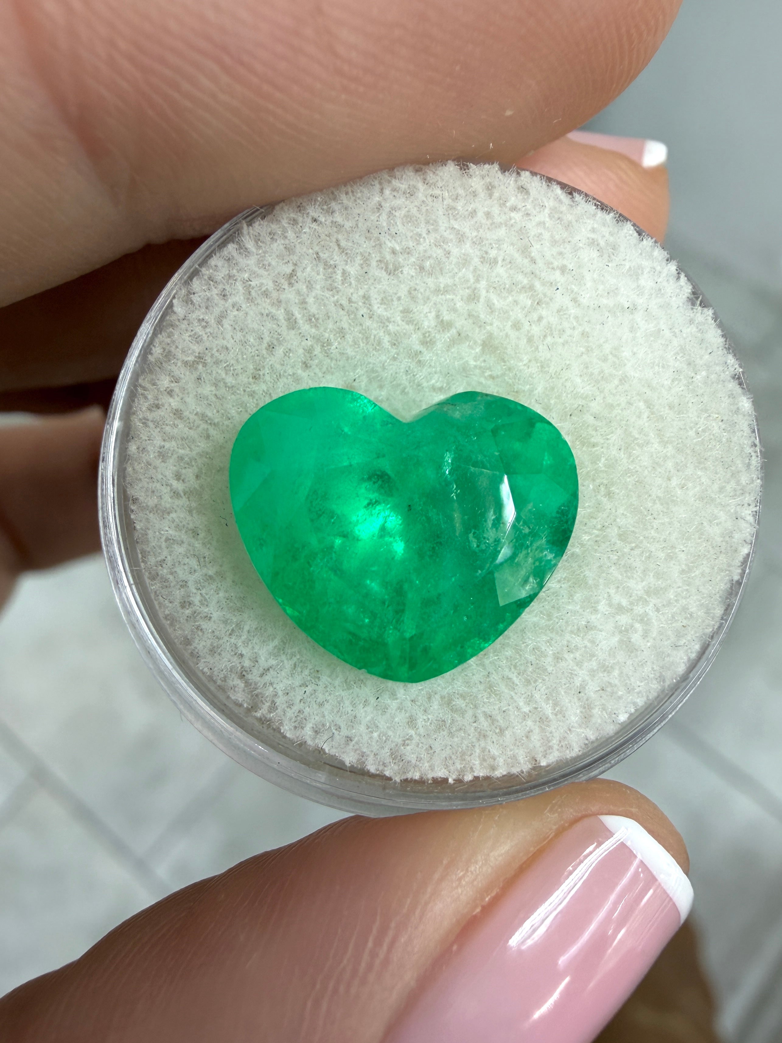 Large 8.47 carat green Colombian emerald in heart cut, natural loose gemstone, 12x14mm from JR Colombian Emeralds.