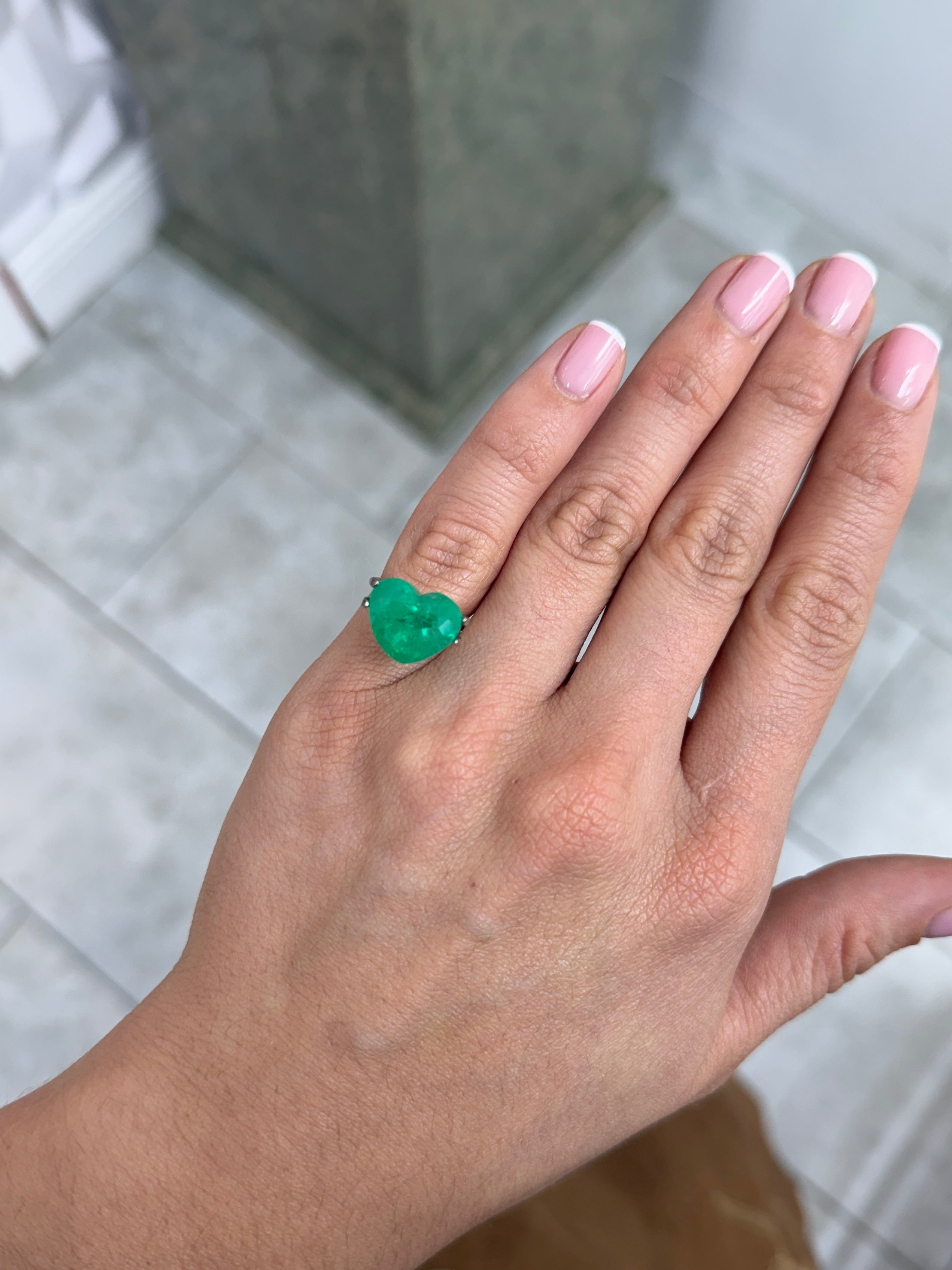 Large 8.47 carat green Colombian emerald in heart cut, natural loose gemstone, 12x14mm size, by JR Colombian Emeralds.
