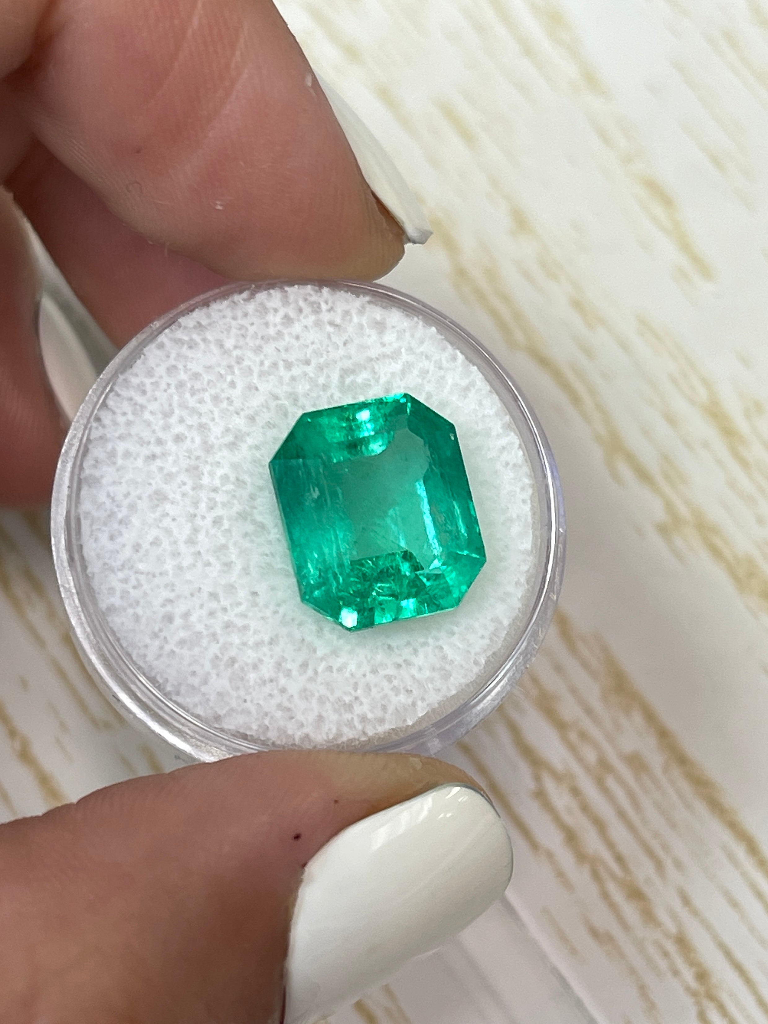 8.51 carat Colombian emerald cut loose emerald from JR Colombian Emeralds, showcasing a classic 13x11 emerald gemstone.