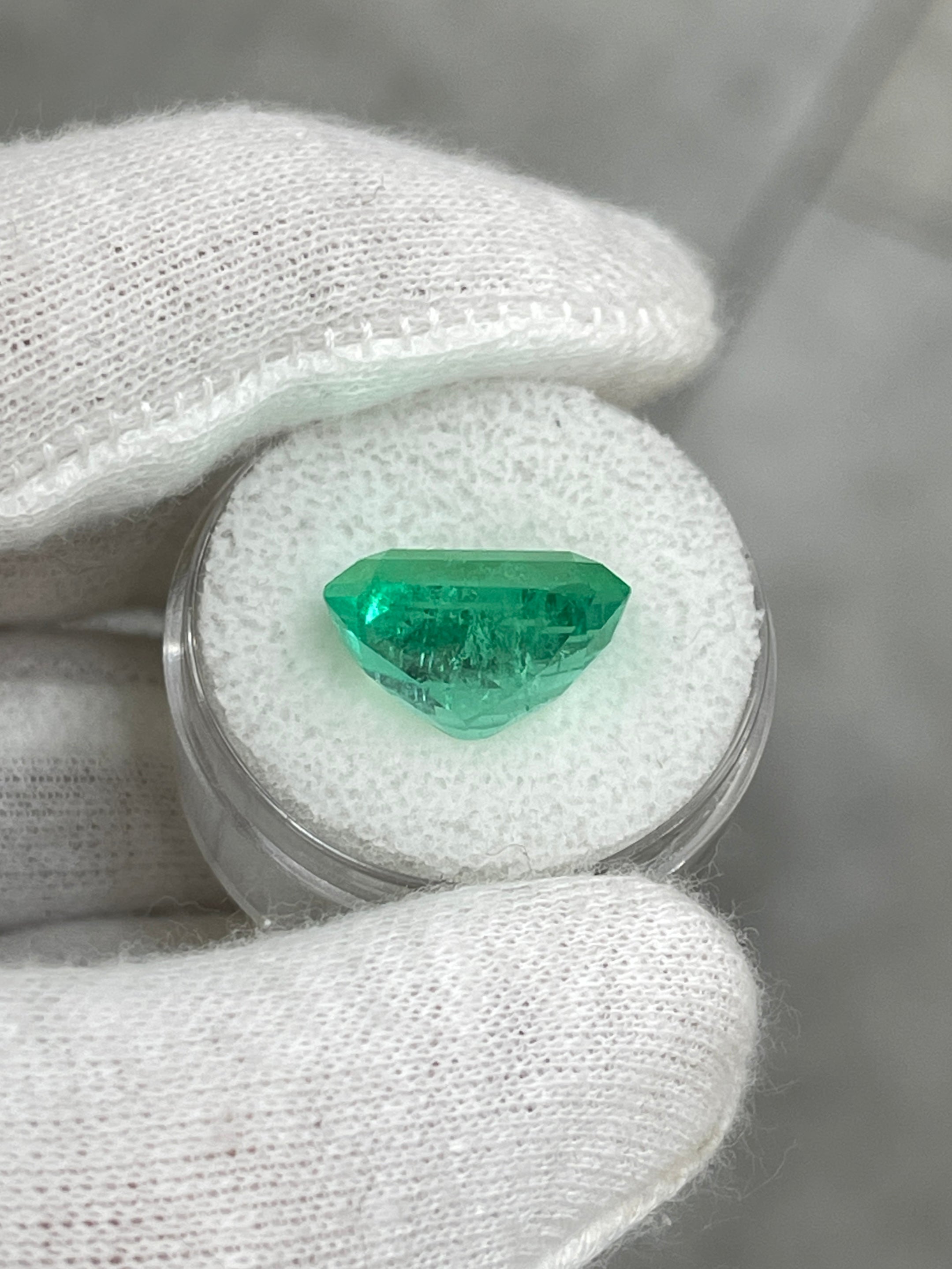 9.51 carat vibrant green Colombian emerald cut loose gemstone, authentic and faceted by JR Colombian Emeralds.