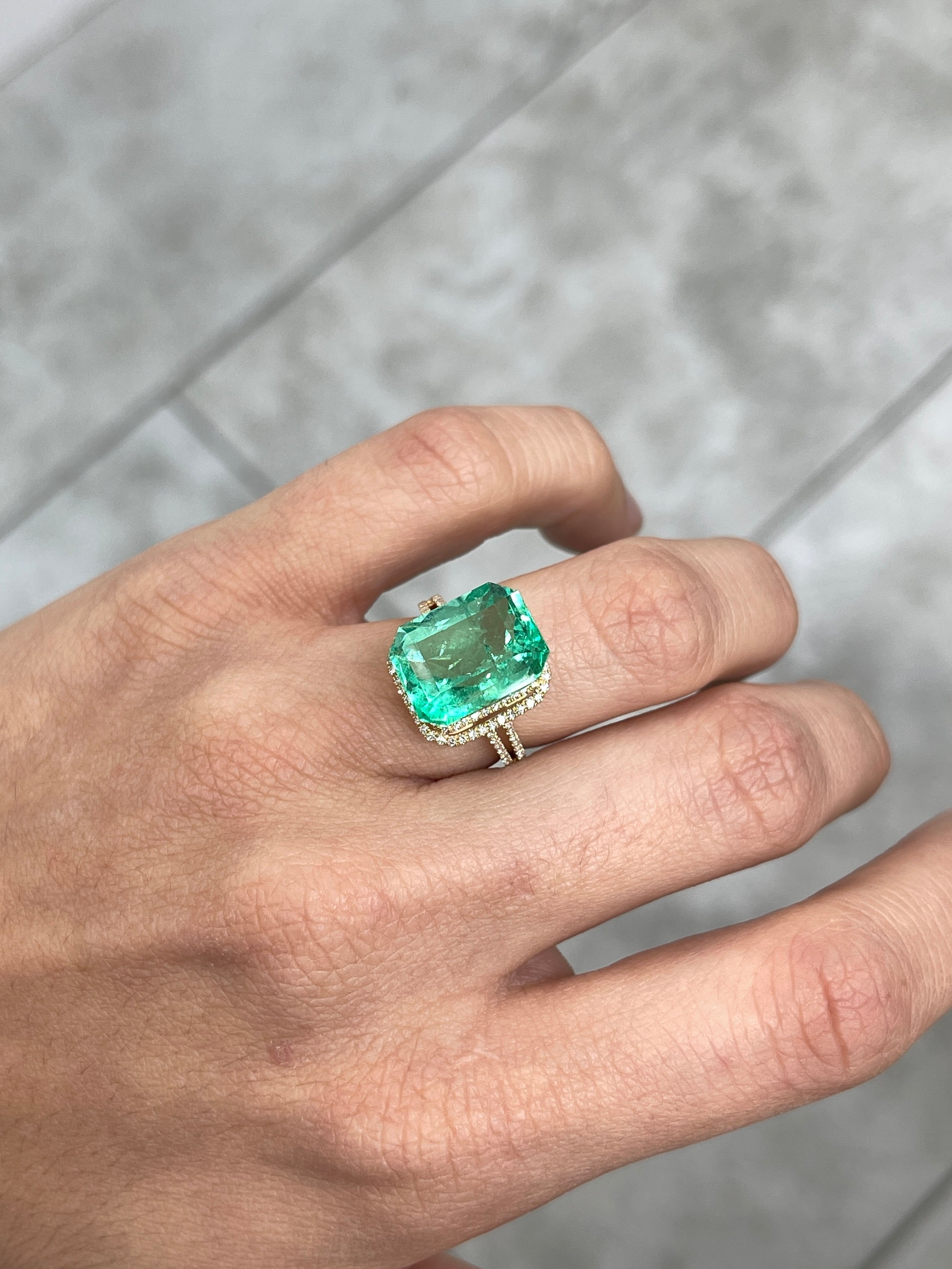 9.51 carat vivacious green Colombian emerald cut loose gemstone from JR Colombian Emeralds, showing vibrant color and clarity