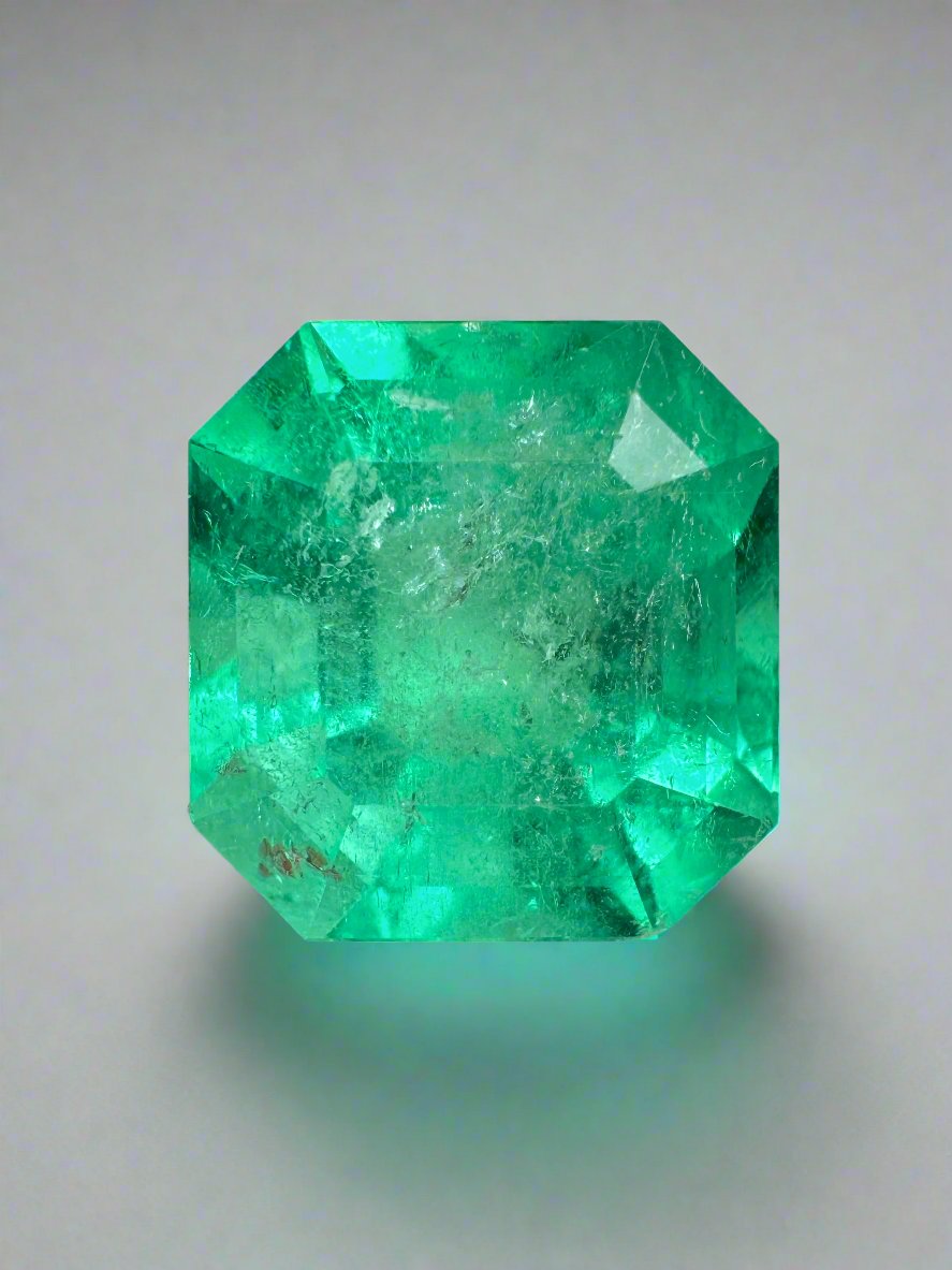 Medium green 9.79 carat Colombian emerald in classic Asscher cut, natural loose gemstone from JR Colombian Emeralds.