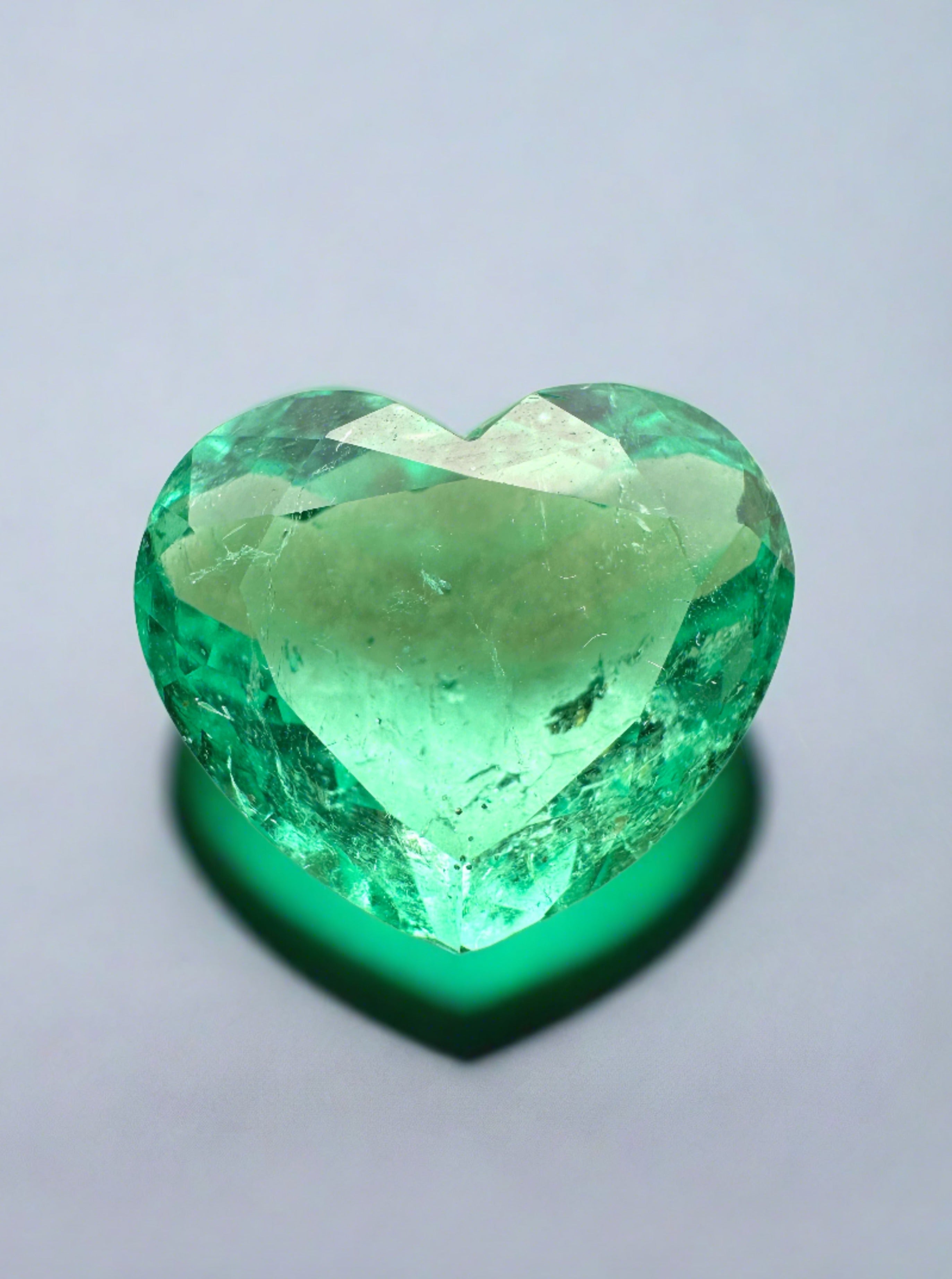 9.84 carat natural Colombian emerald loose gemstone, heart cut, bubbly eye-clean clarity, from JR Colombian Emeralds.