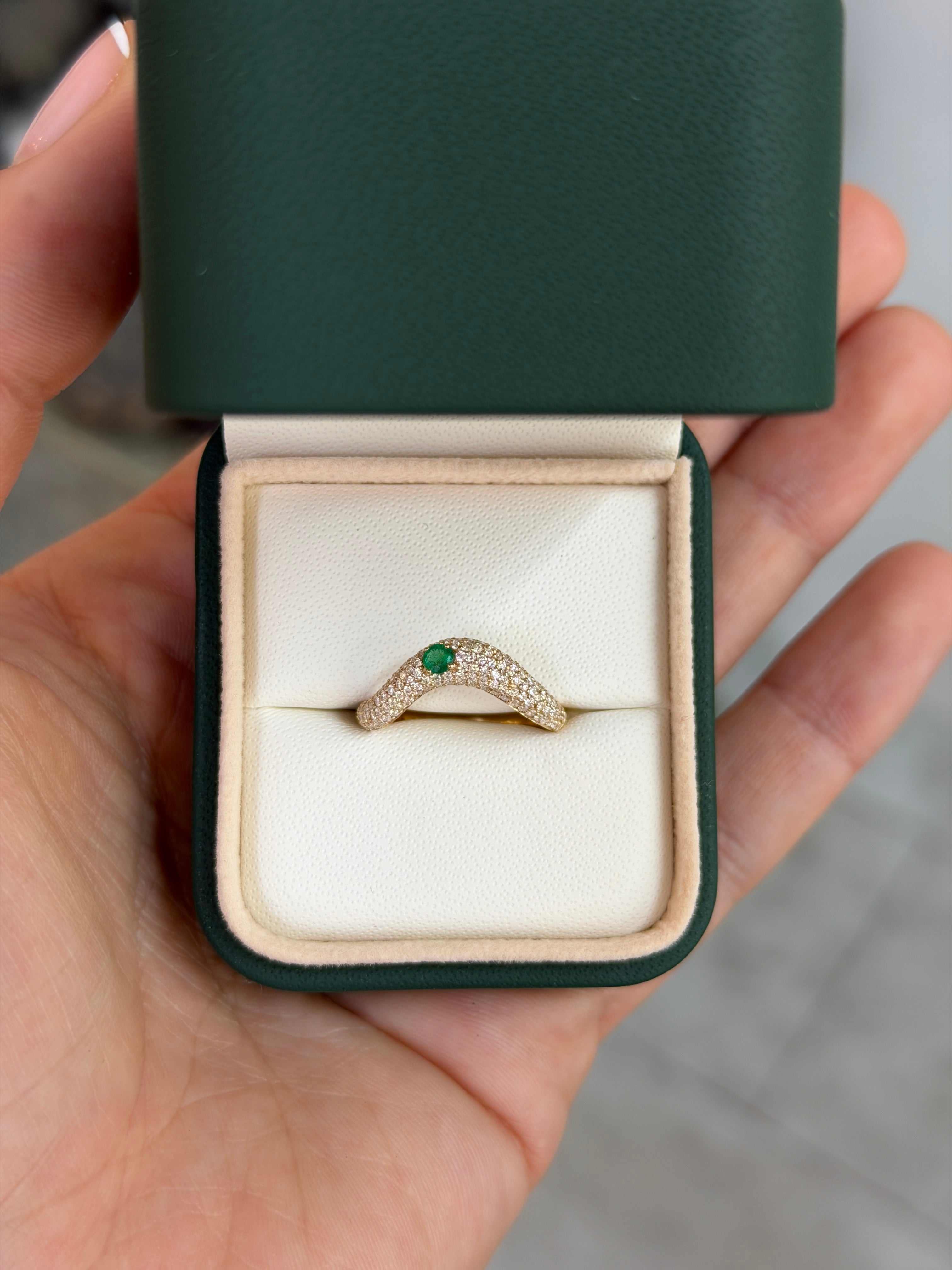 Custom curved wedding band with emerald and diamond pave accents in 14K gold, size 7, from JR Colombian Emeralds.