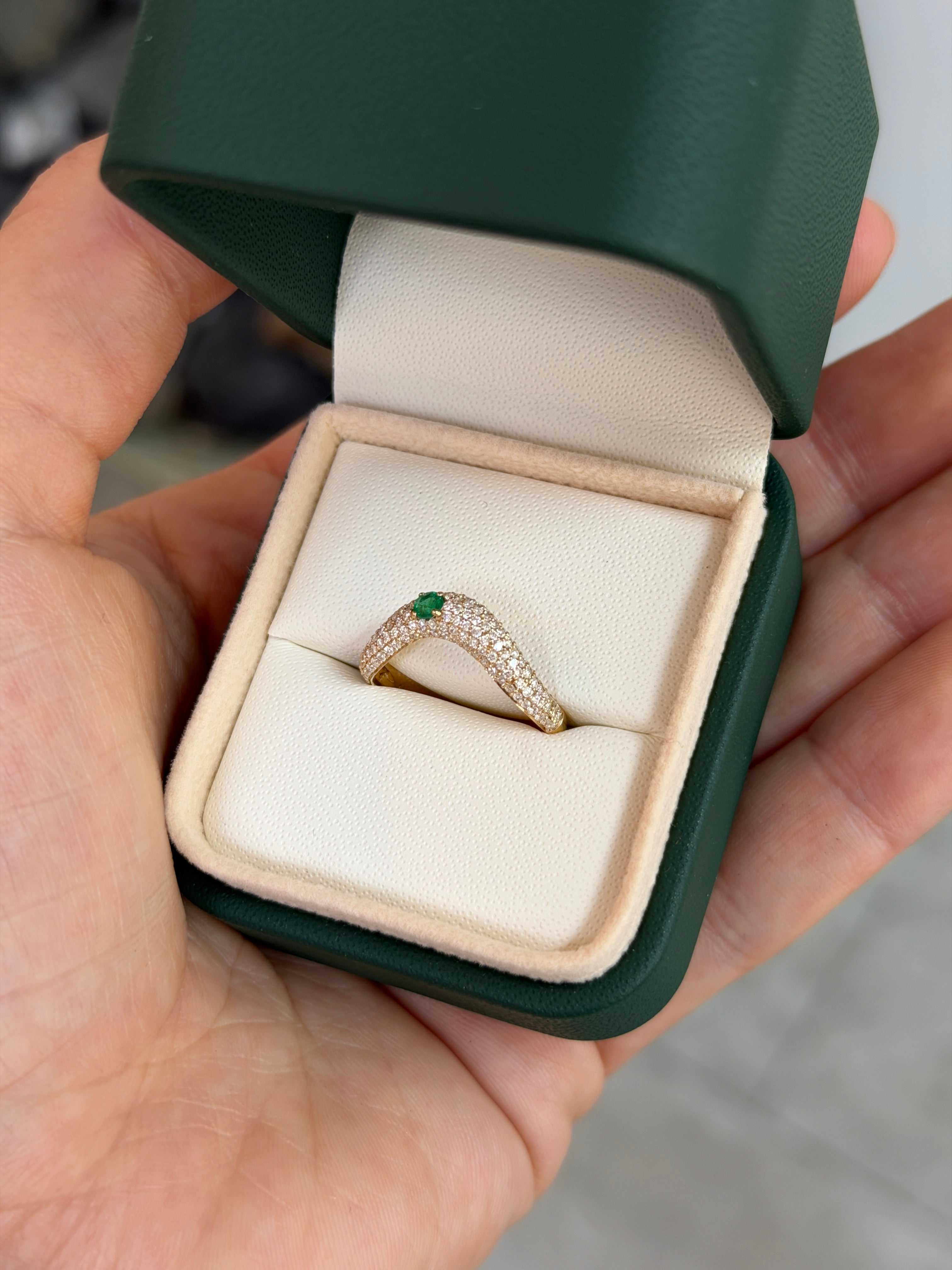 Custom curved emerald and diamond pave wedding band in 14K gold, size 7, by JR Colombian Emeralds.