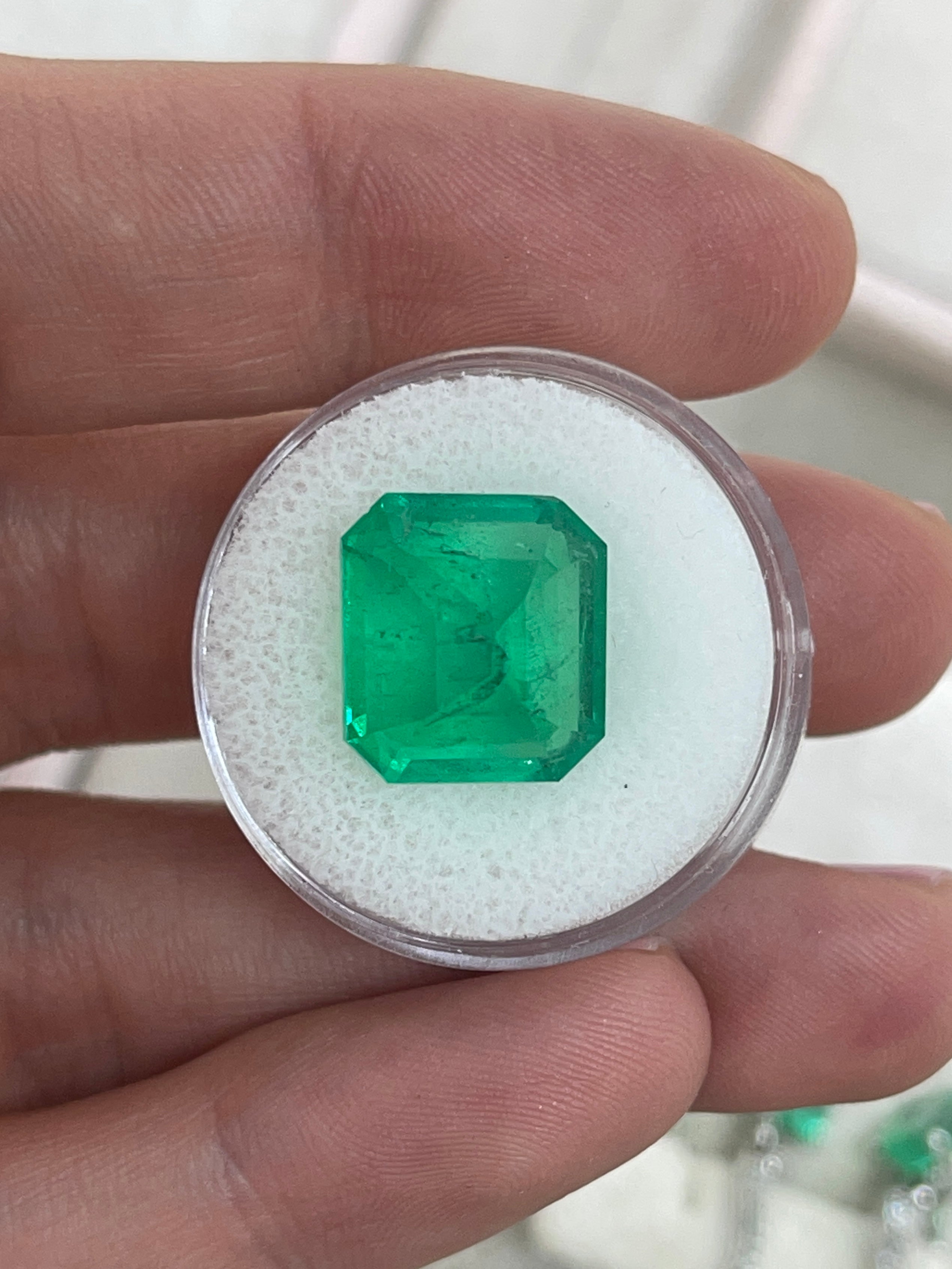 Large 10.13 carat Muzo Colombian emerald, loose deep jungle green, emerald cut, natural gemstone from JR Colombian Emeralds.
